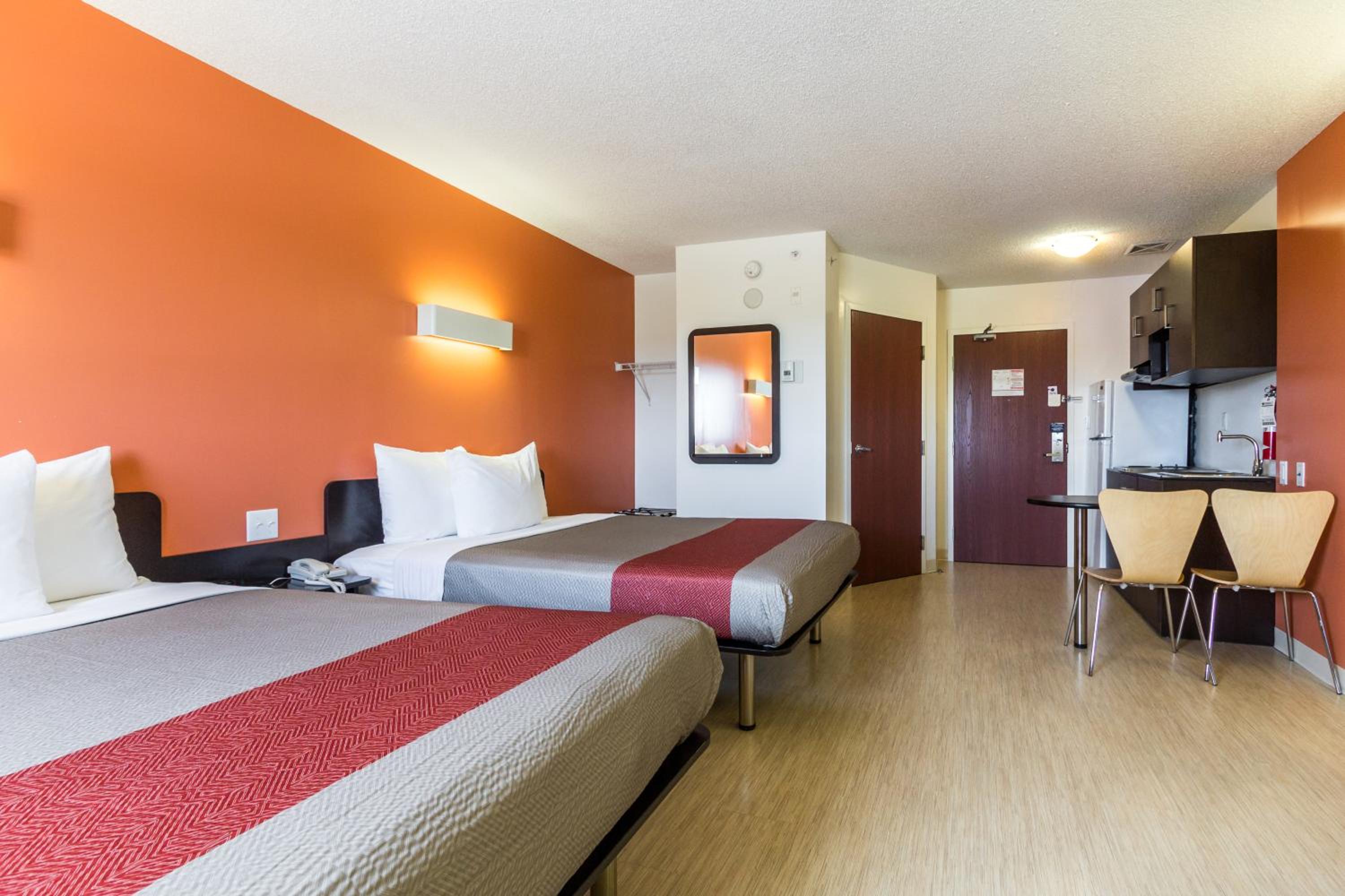 Deluxe Queen Room with Two Queen Beds - Non-Smoking - Photo 1
