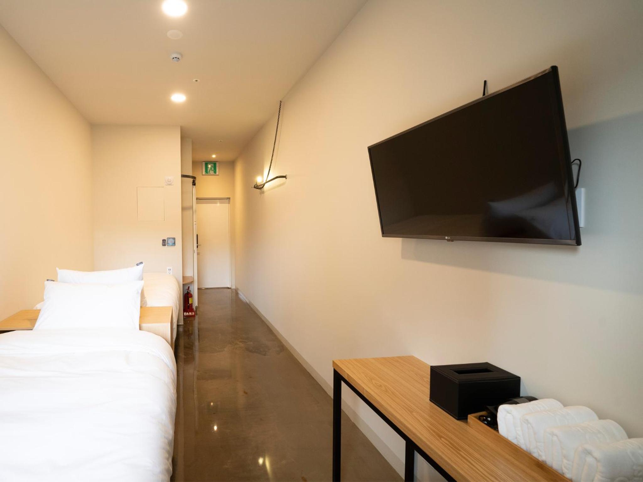 Standard Twin Room - Photo 3
