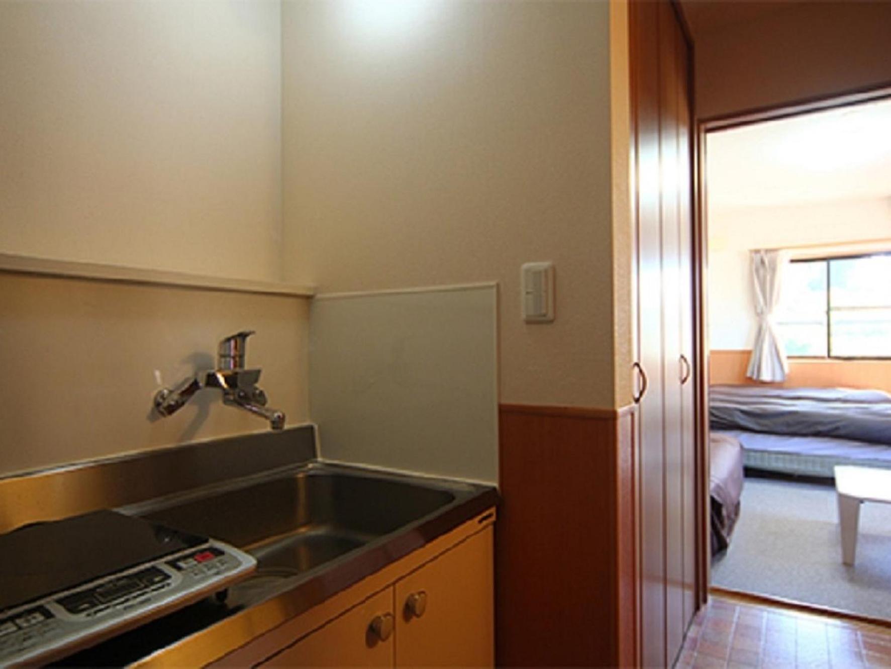 Quadruple Room with Private Bathroom photo 2
