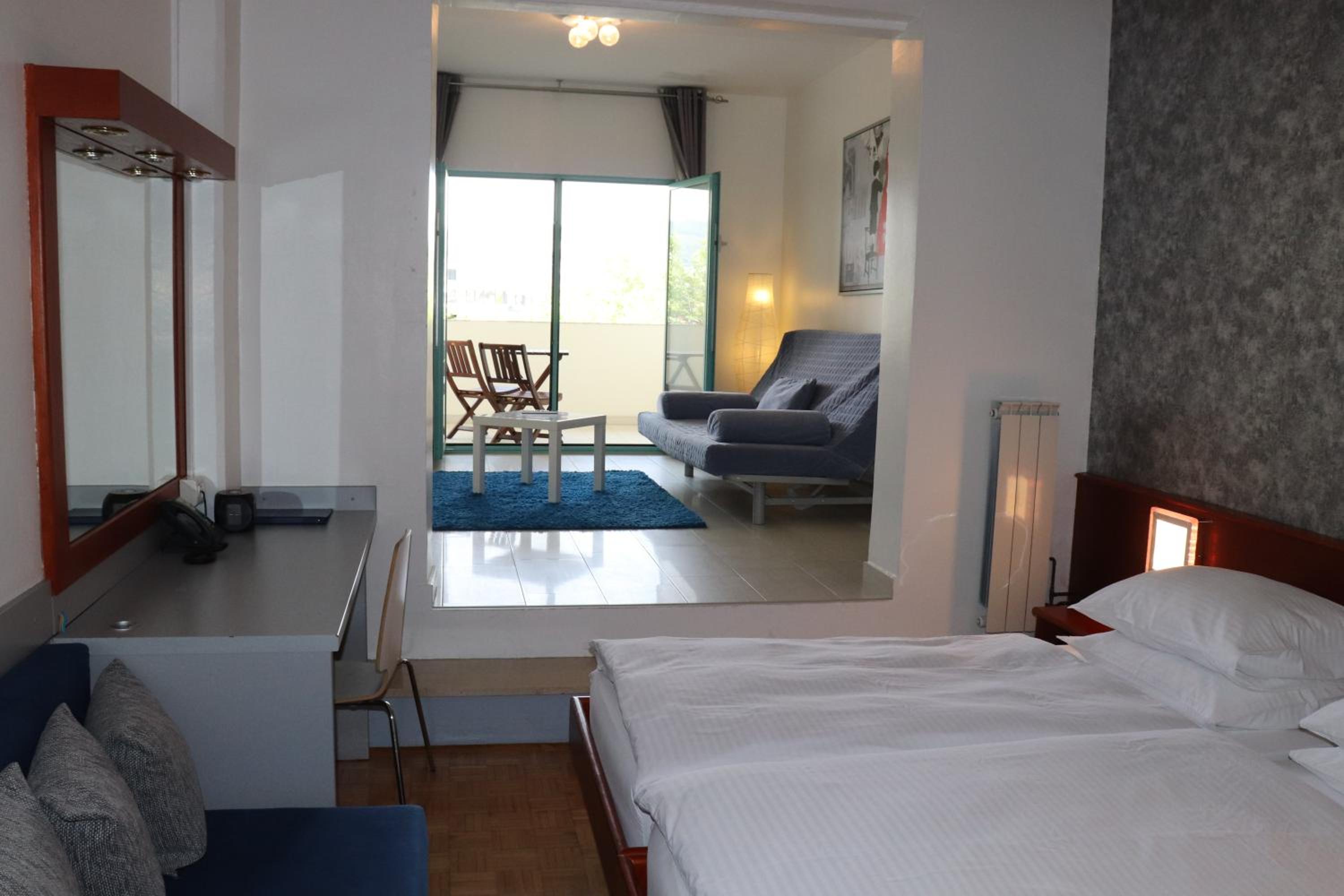 Quadruple Room with Balcony photo 1
