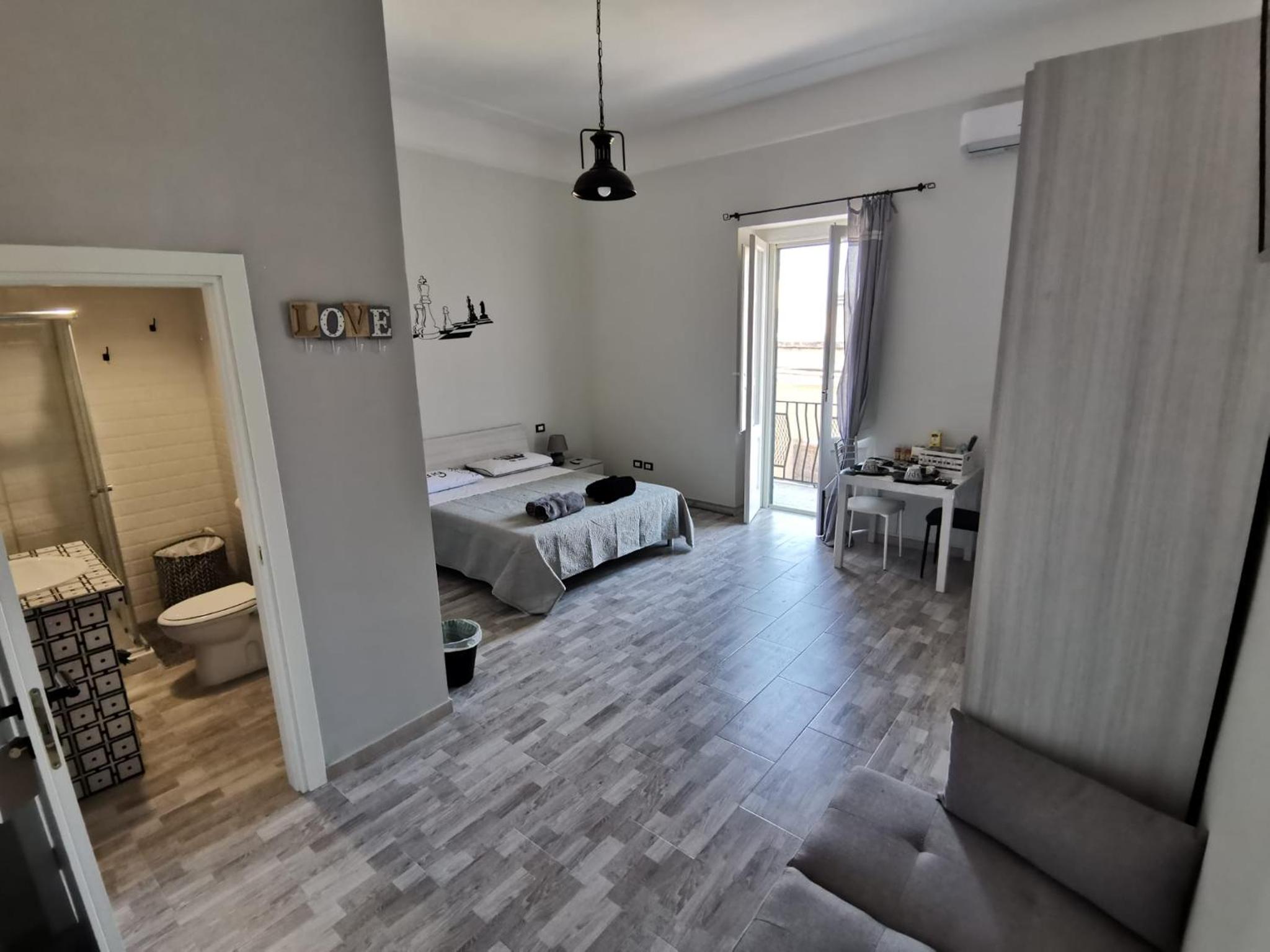 Quadruple Room with Private Bathroom