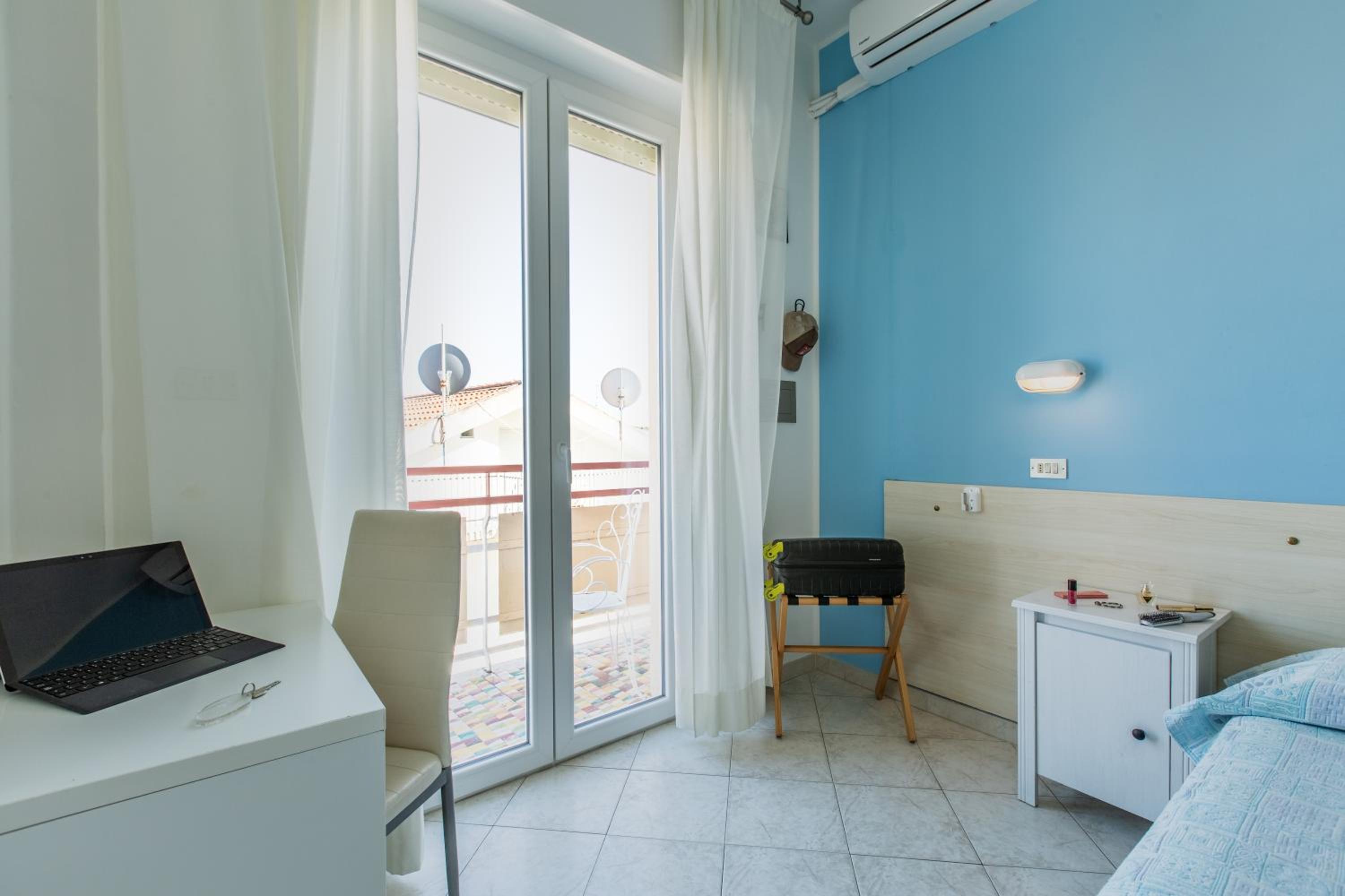 Quadruple Room with Balcony