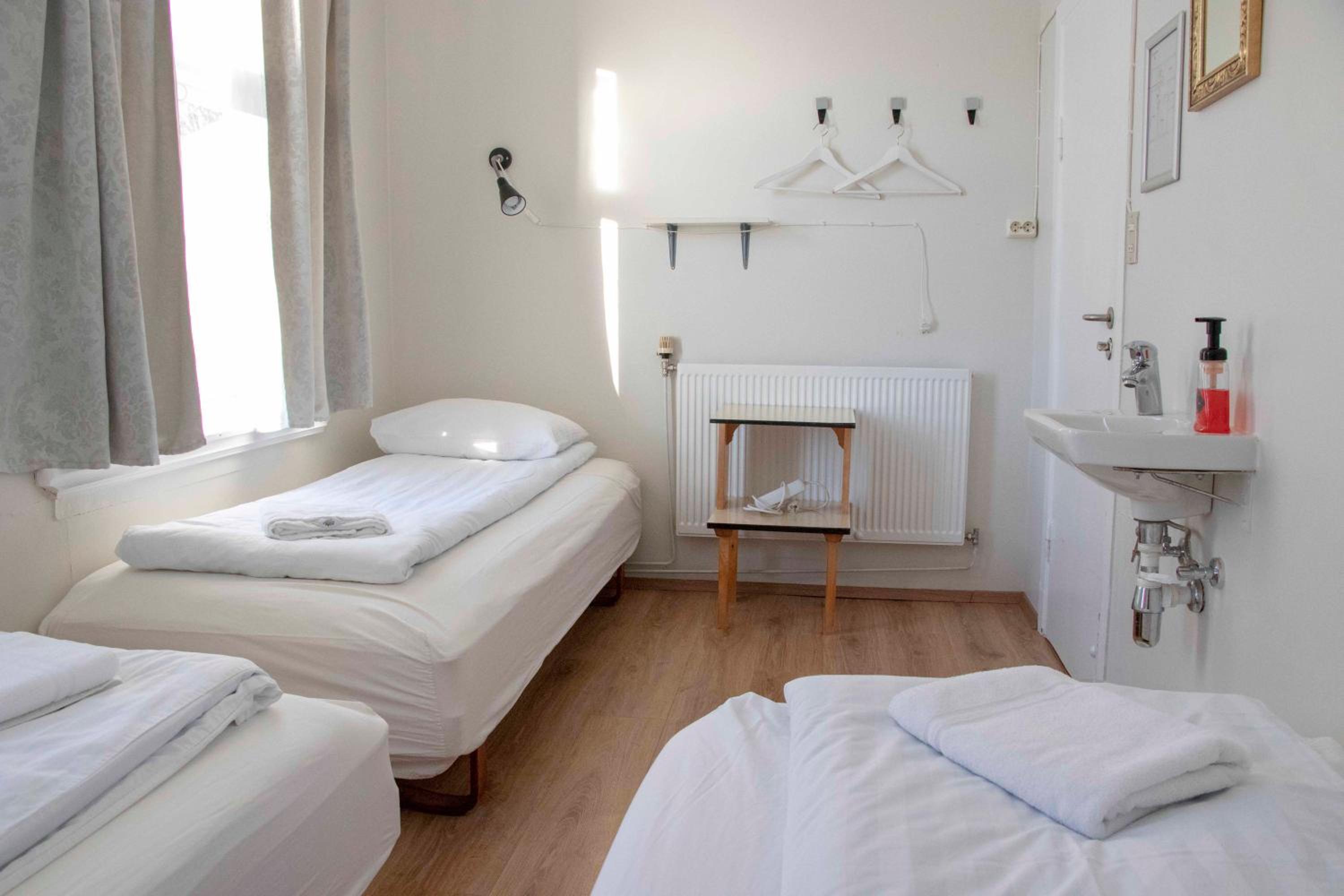 Basic Triple Room With Shared Bathroom