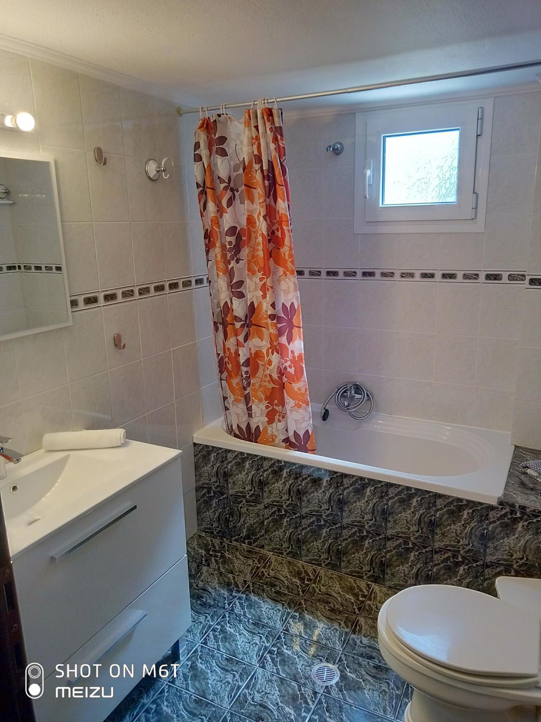 Three-Bedroom House photo 3