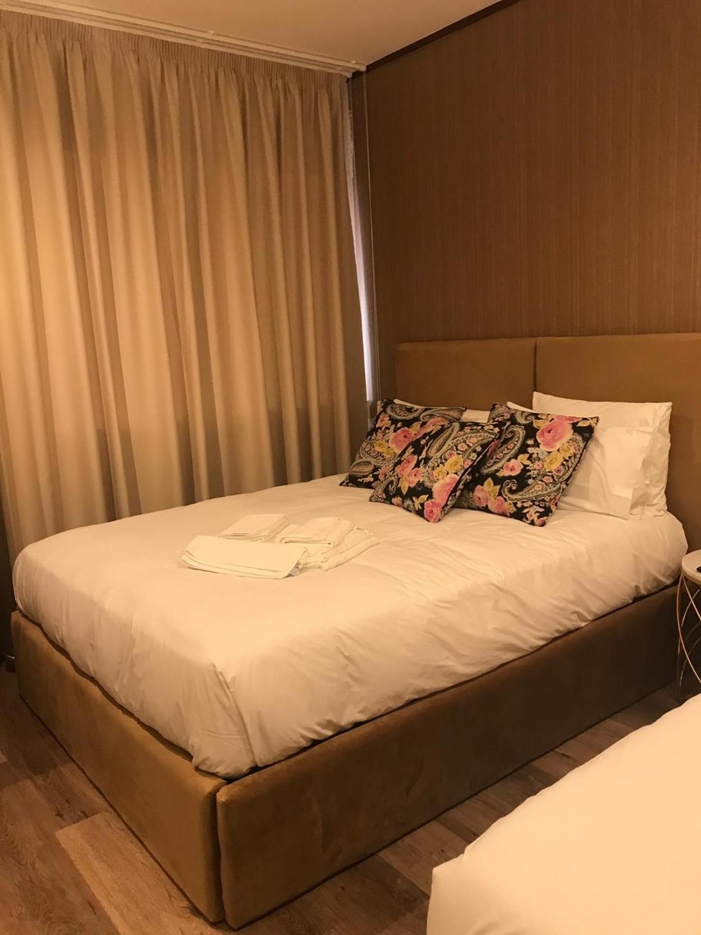 Quadruple Room with Shared Bathroom