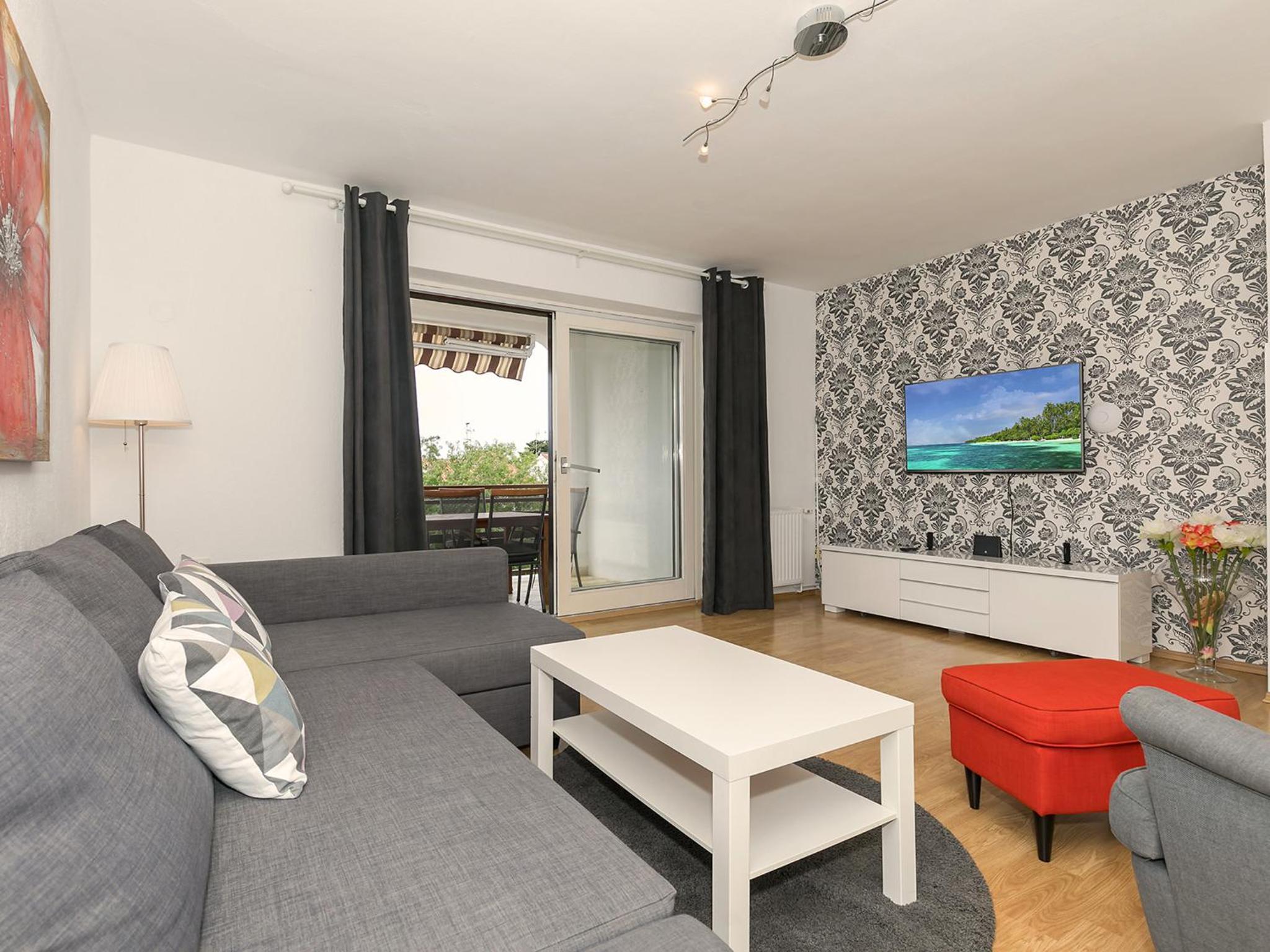Three-Bedroom Apartment with Balcony