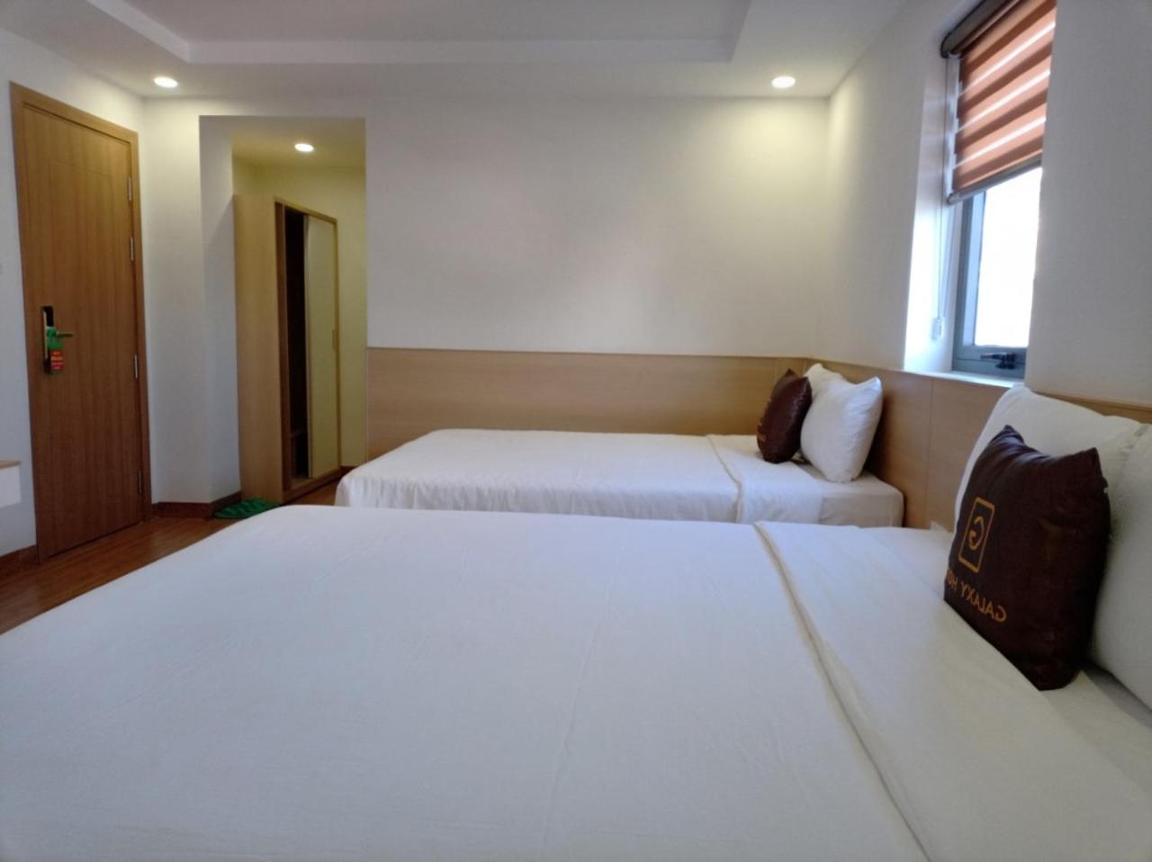 Deluxe Queen Room with Two Queen Beds - Photo 2