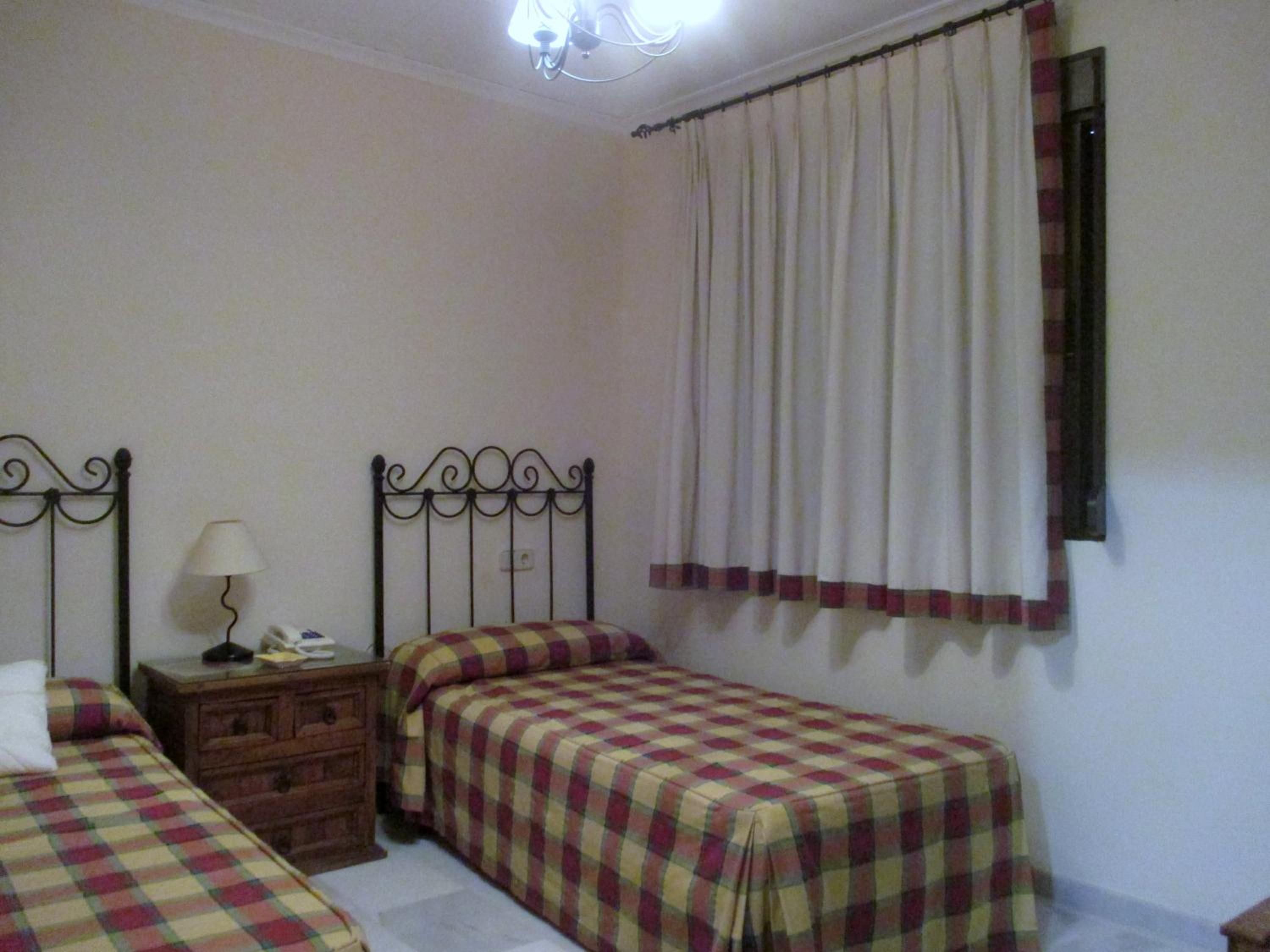 Habitación Doble con Dos Camas Dobles