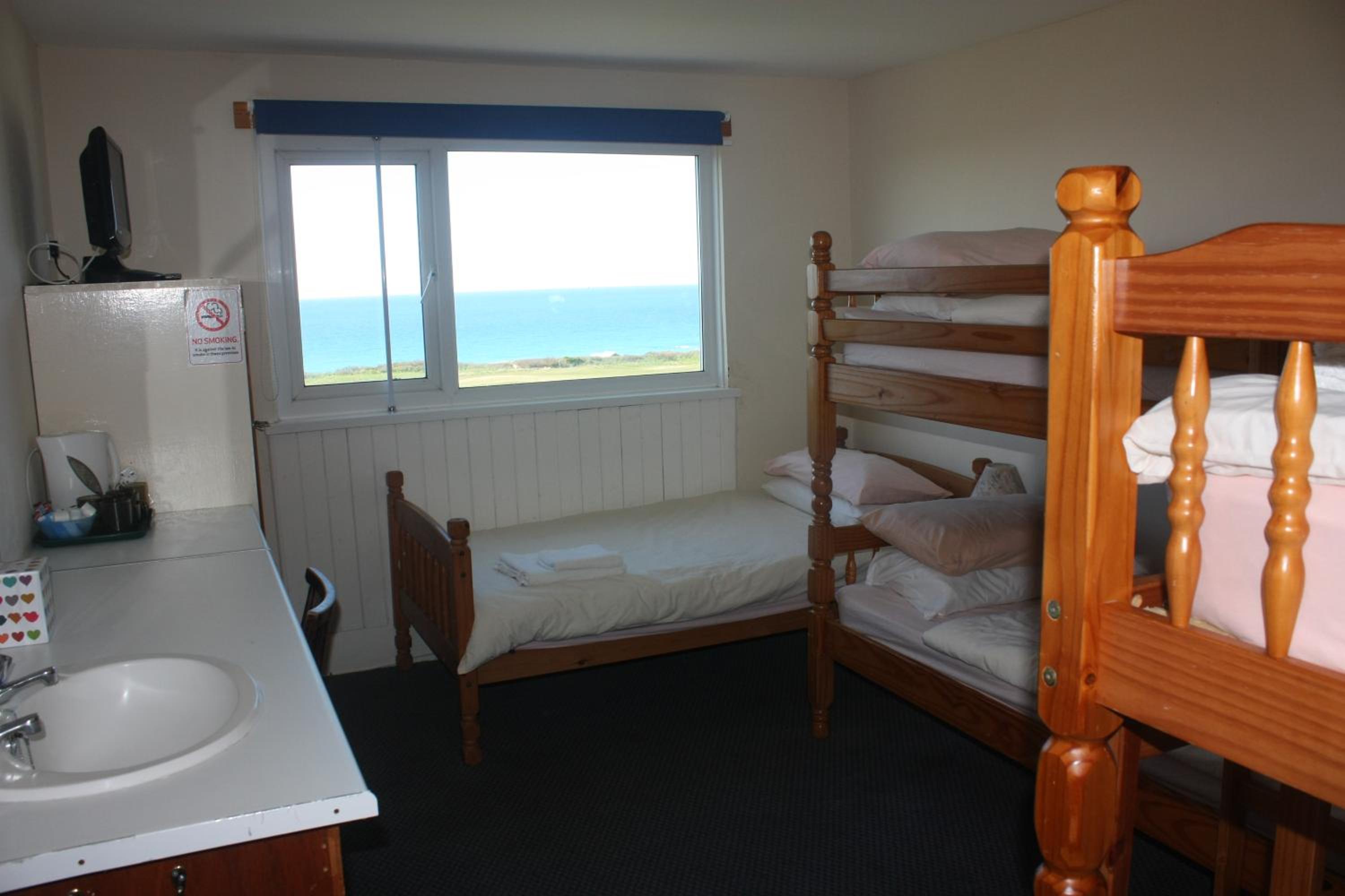 Quadruple Room with Shared Bathroom