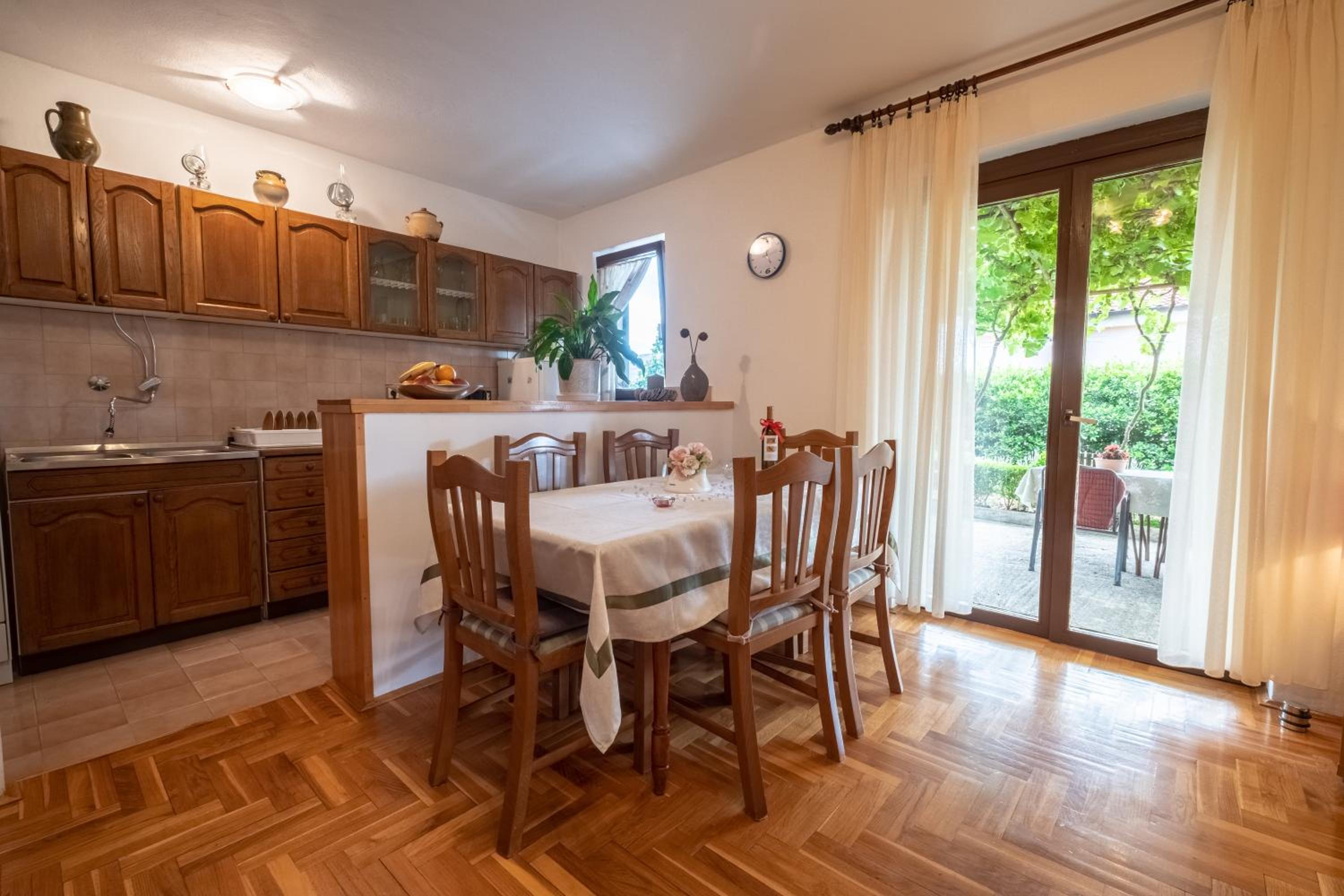 Three-Bedroom Apartment with Patio - Photo 2