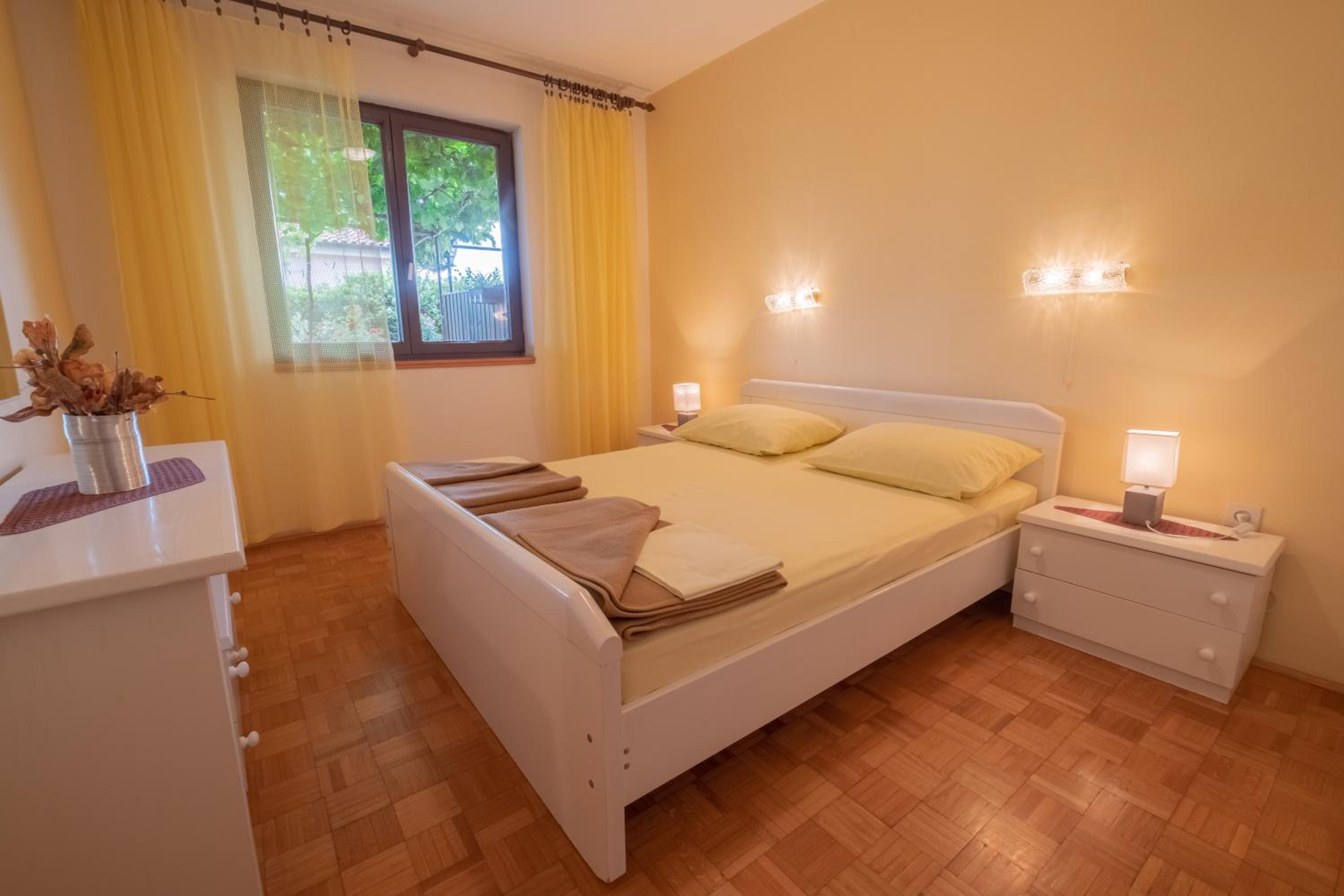 Three-Bedroom Apartment with Patio - Photo 7