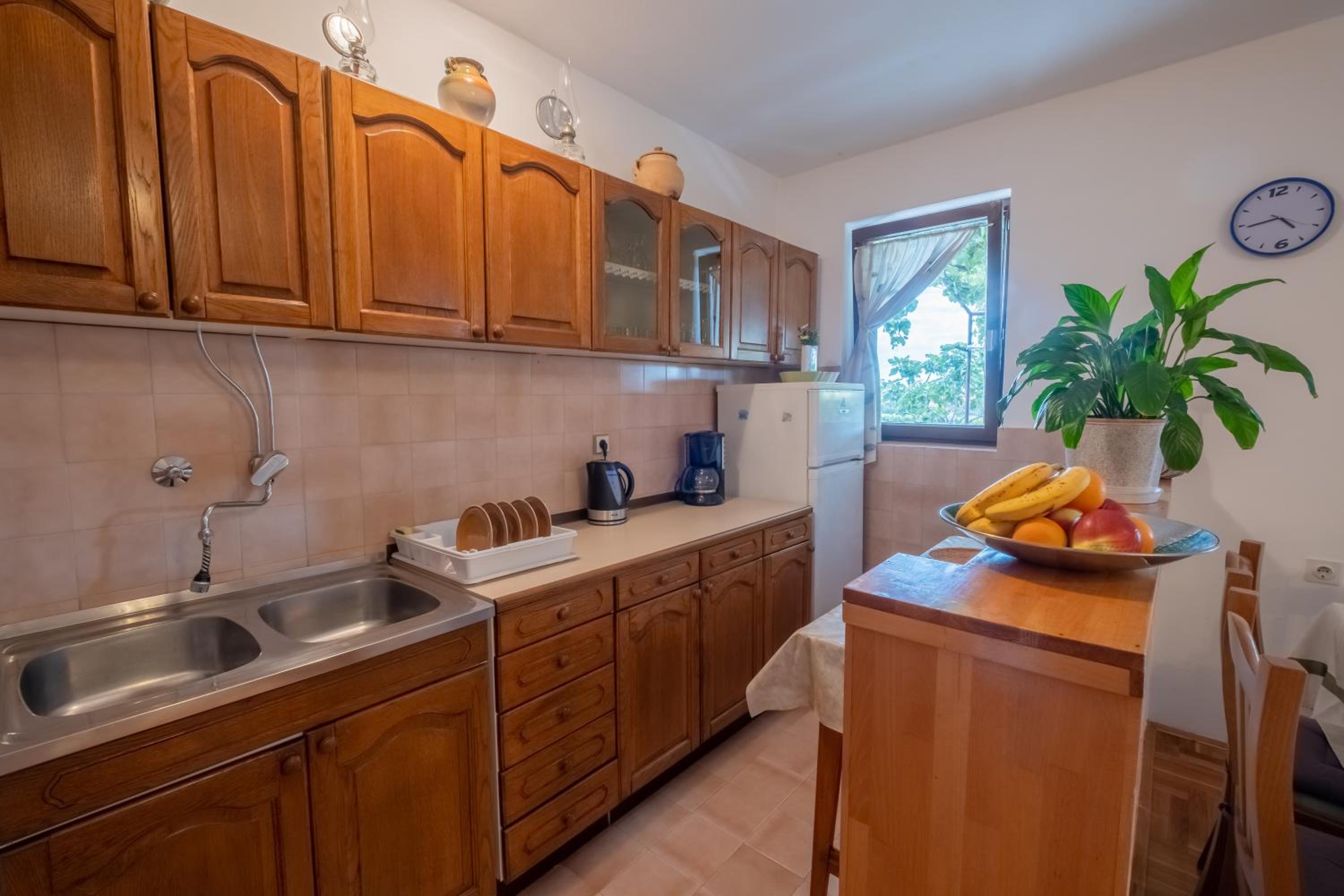 Three-Bedroom Apartment with Patio - Photo 13