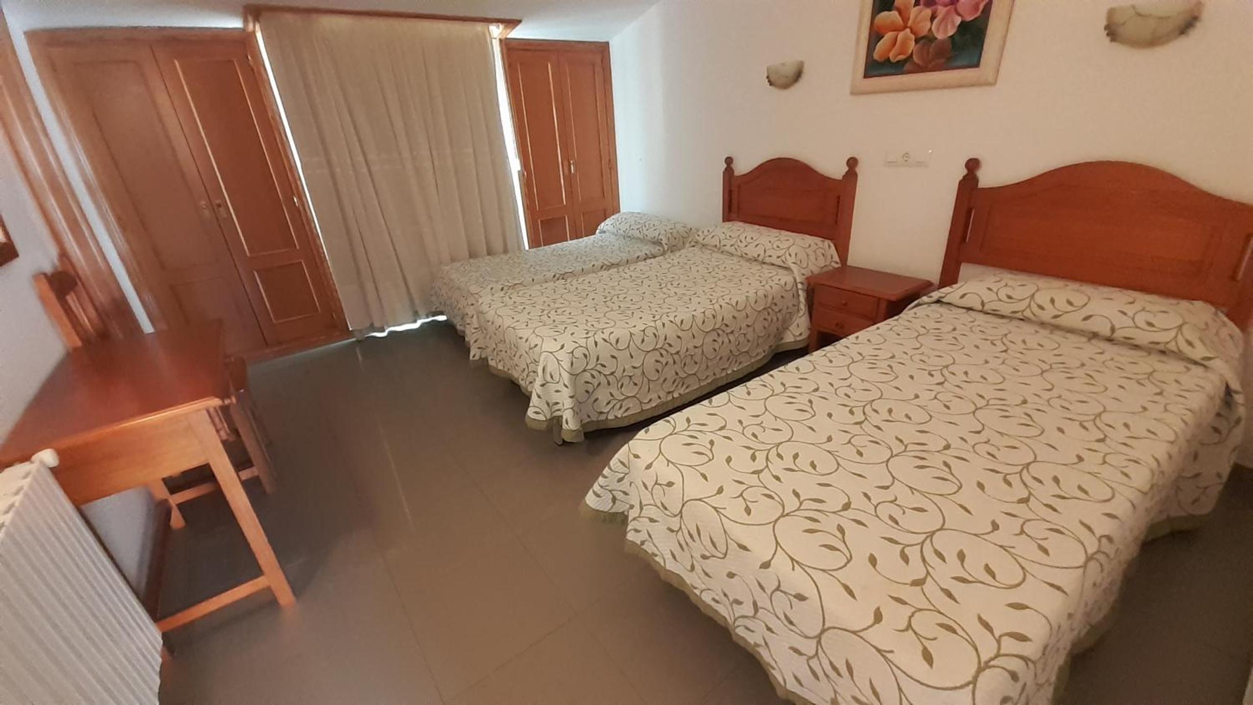 Habitación Triple con Baño Privado