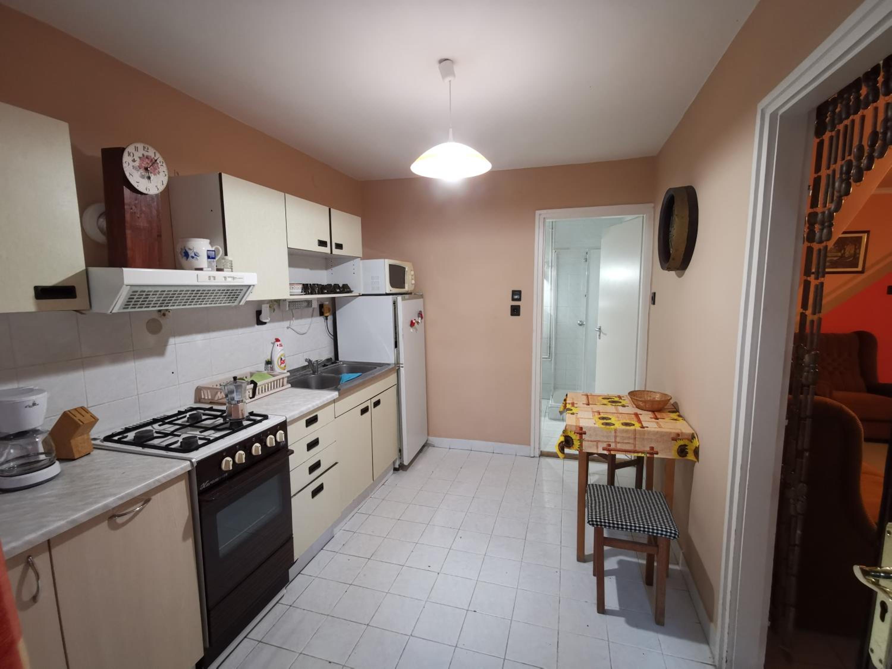 Three-Bedroom House - Photo 17