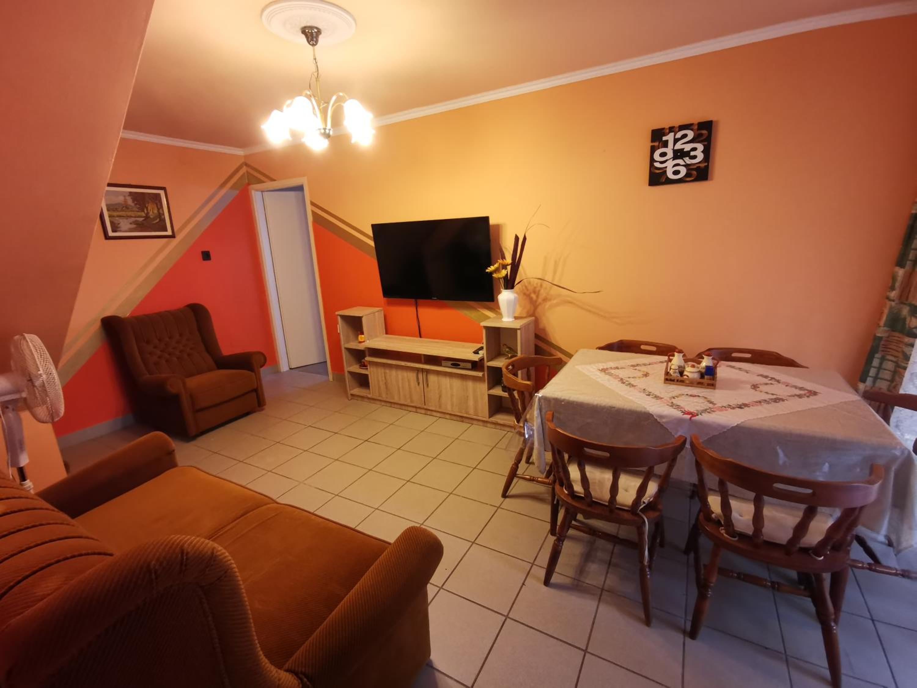 Three-Bedroom House - Photo 16