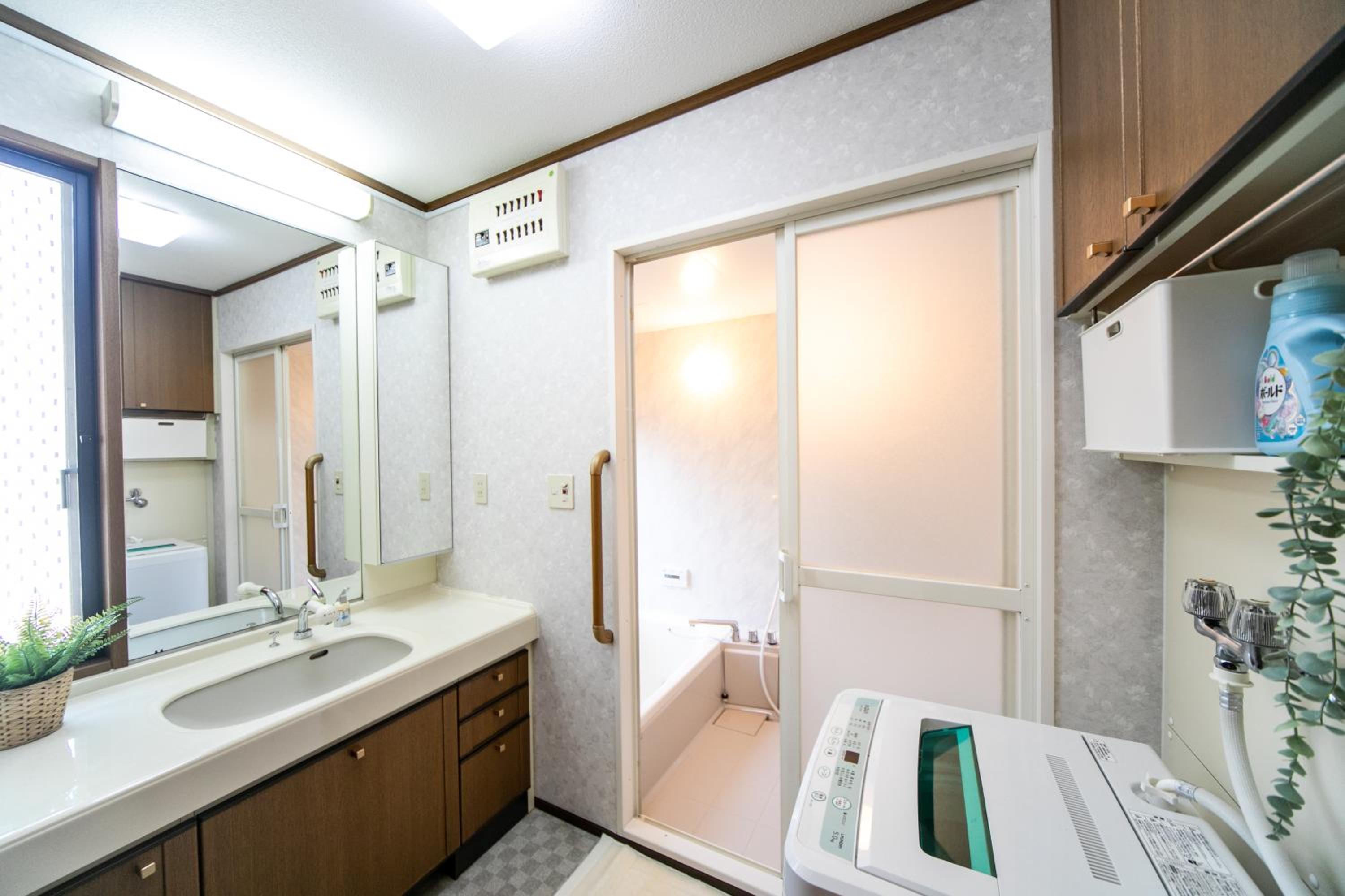 Three-Bedroom House - Photo 51