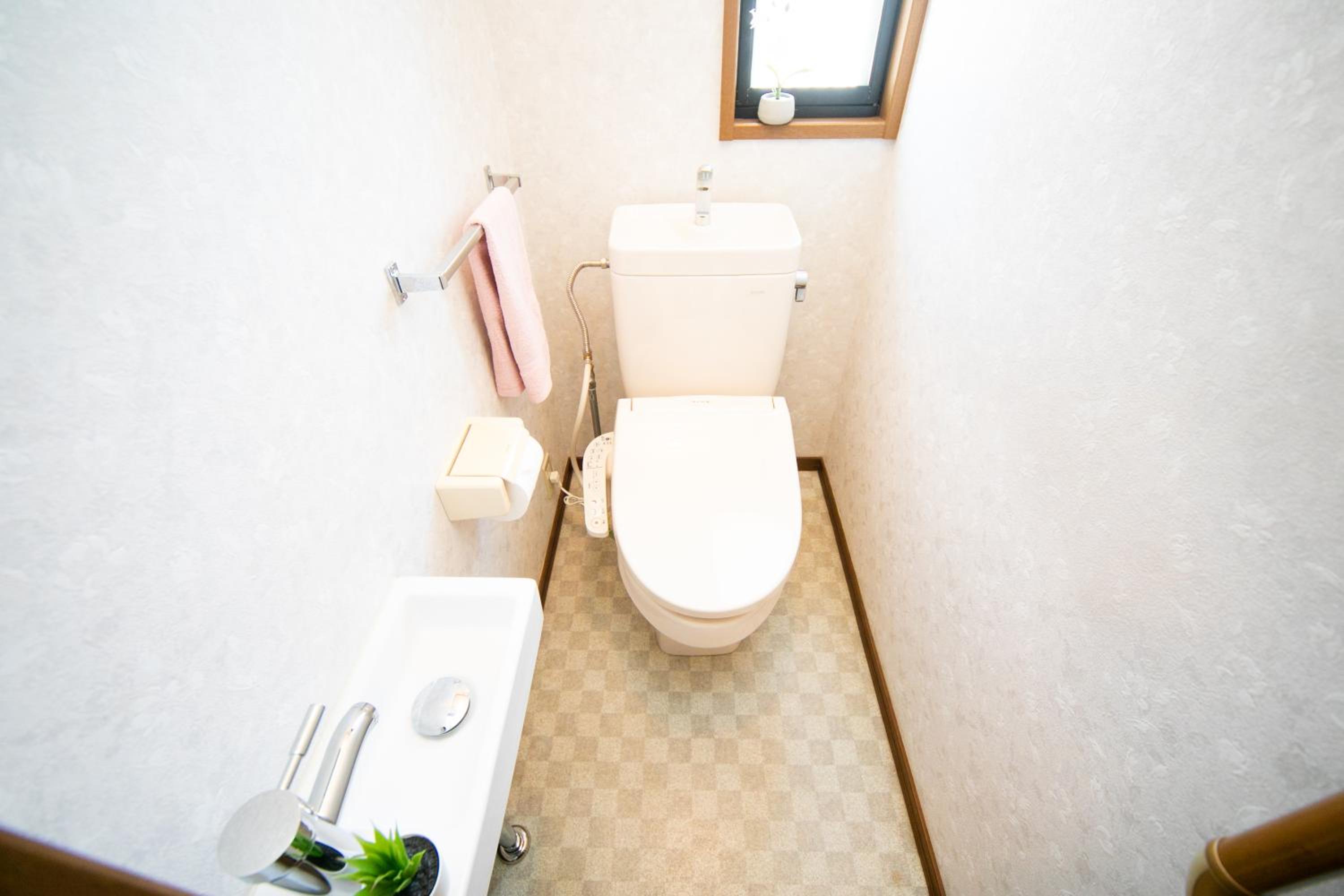 Three-Bedroom House - Photo 49