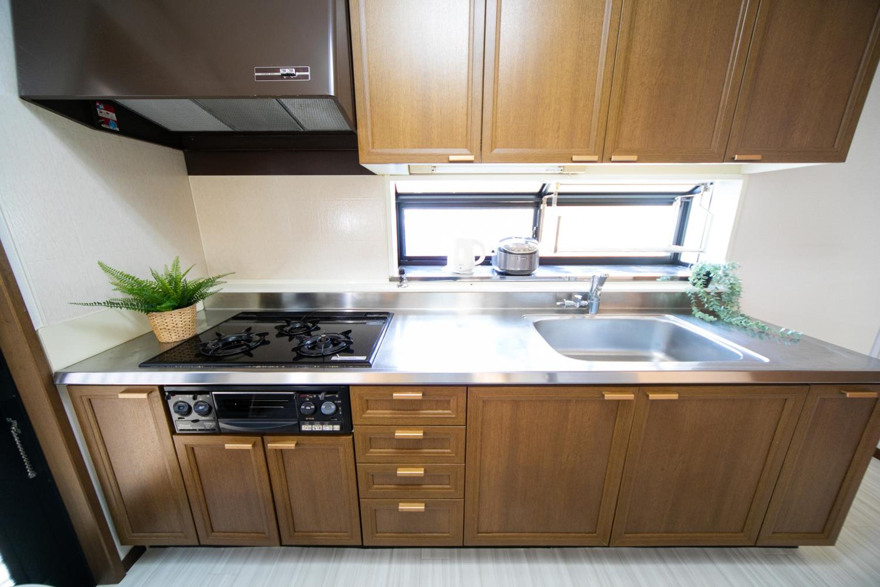 Three-Bedroom House - Photo 45