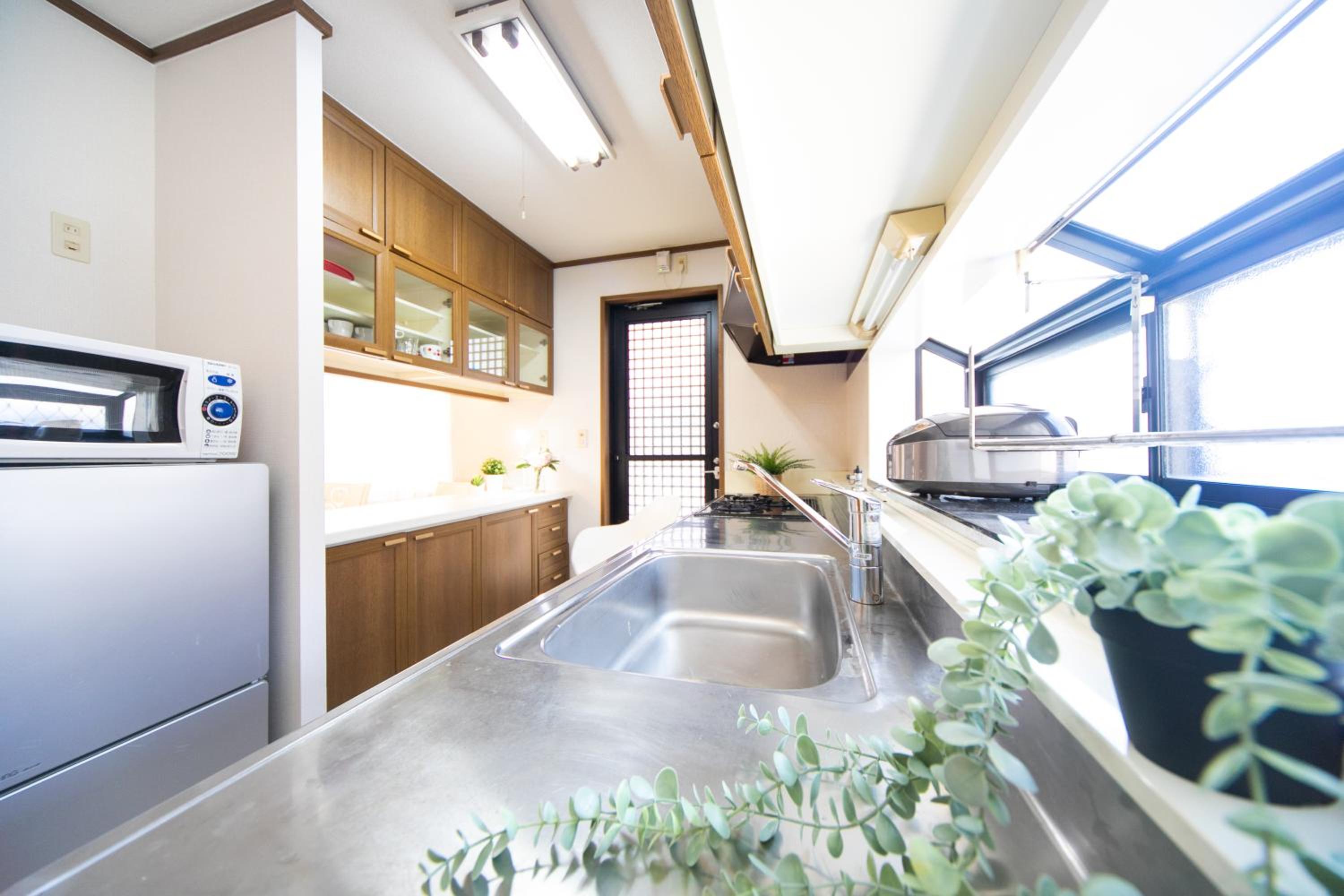 Three-Bedroom House - Photo 44