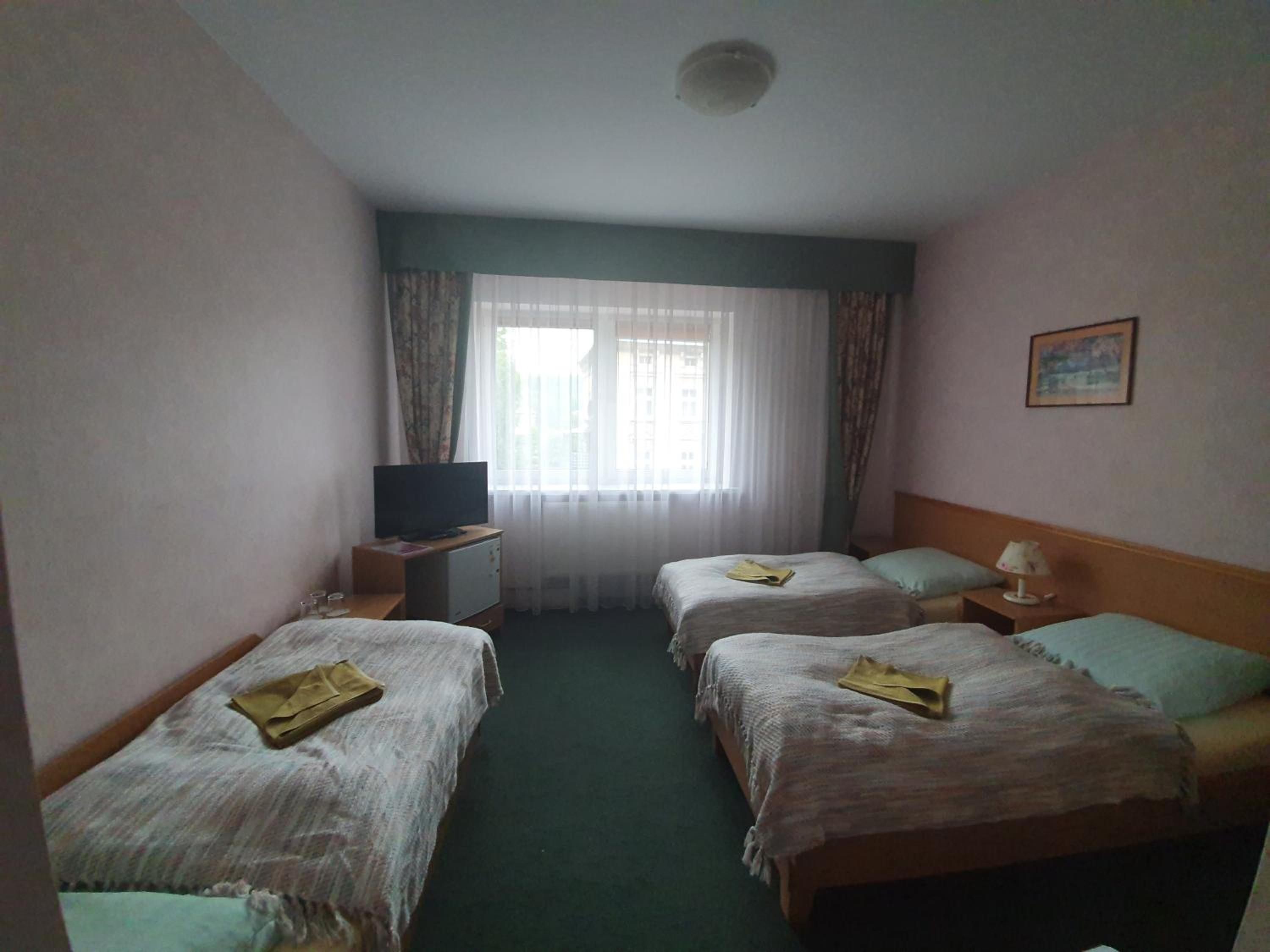 Triple Room - Photo 1