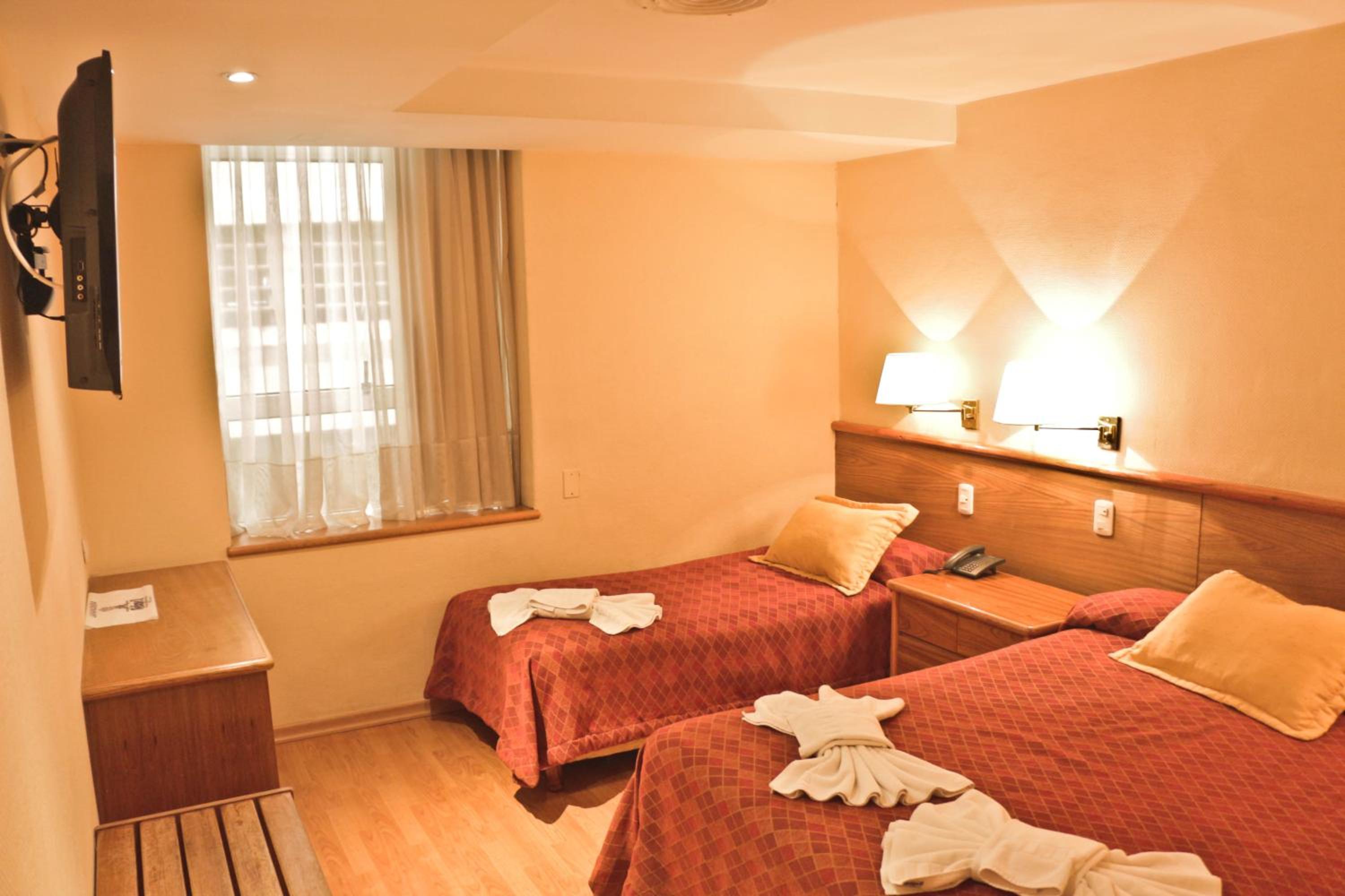 Triple Room (2 Adults + 1 Child) photo 1