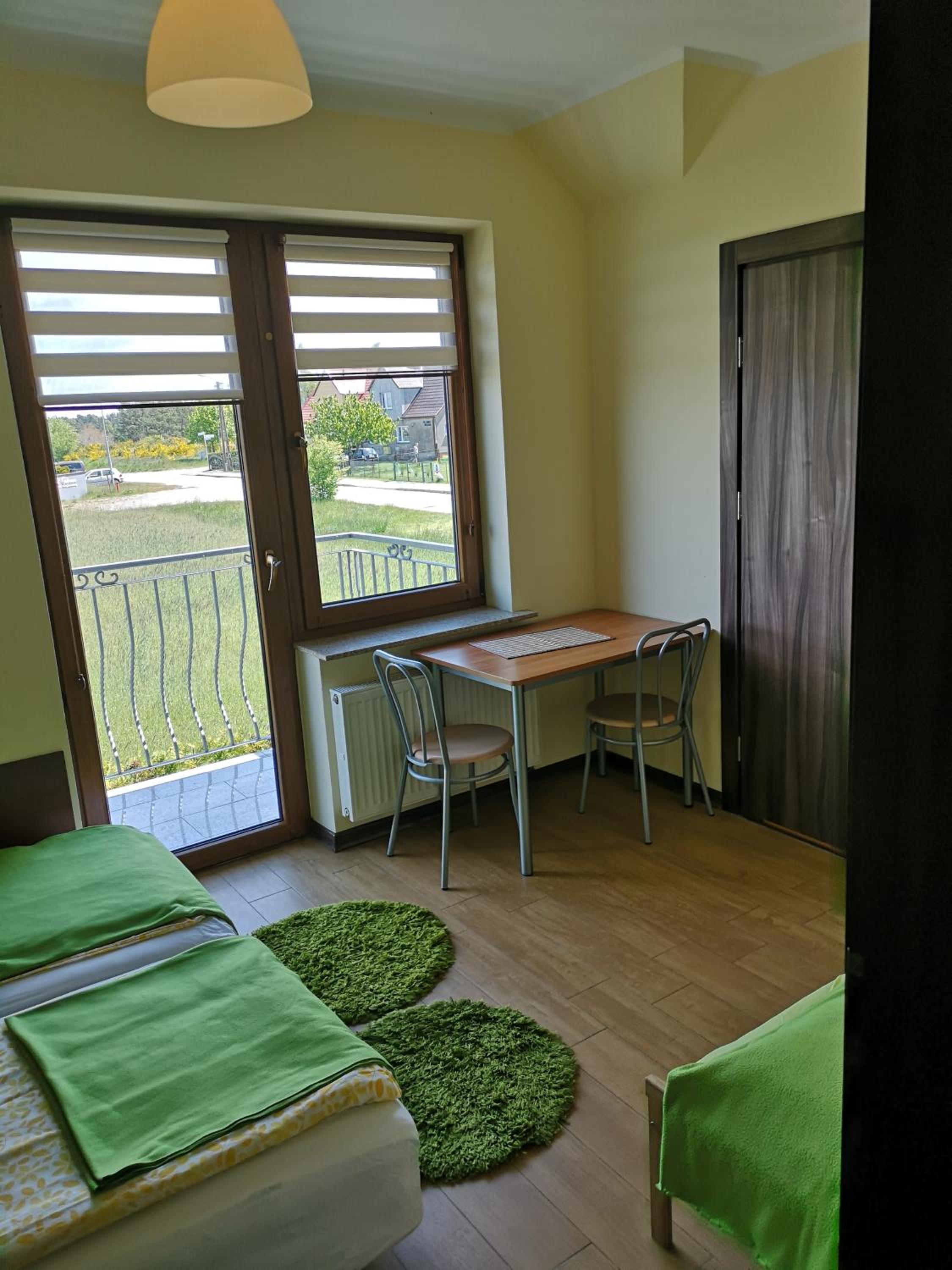 Double Room with Balcony (2 Adults + 1 Child) photo 1