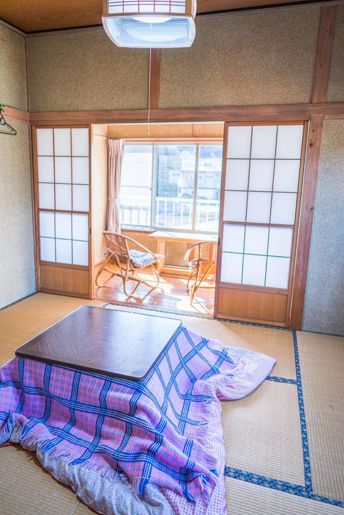 Economy Triple Room with Shared Bathroom photo 2