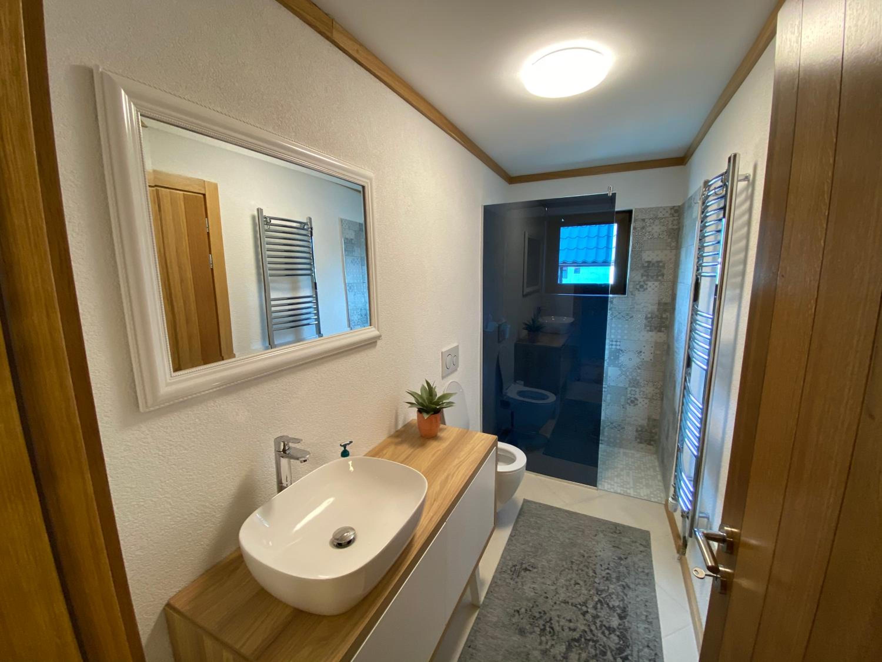 Three-Bedroom Apartment - Photo 22