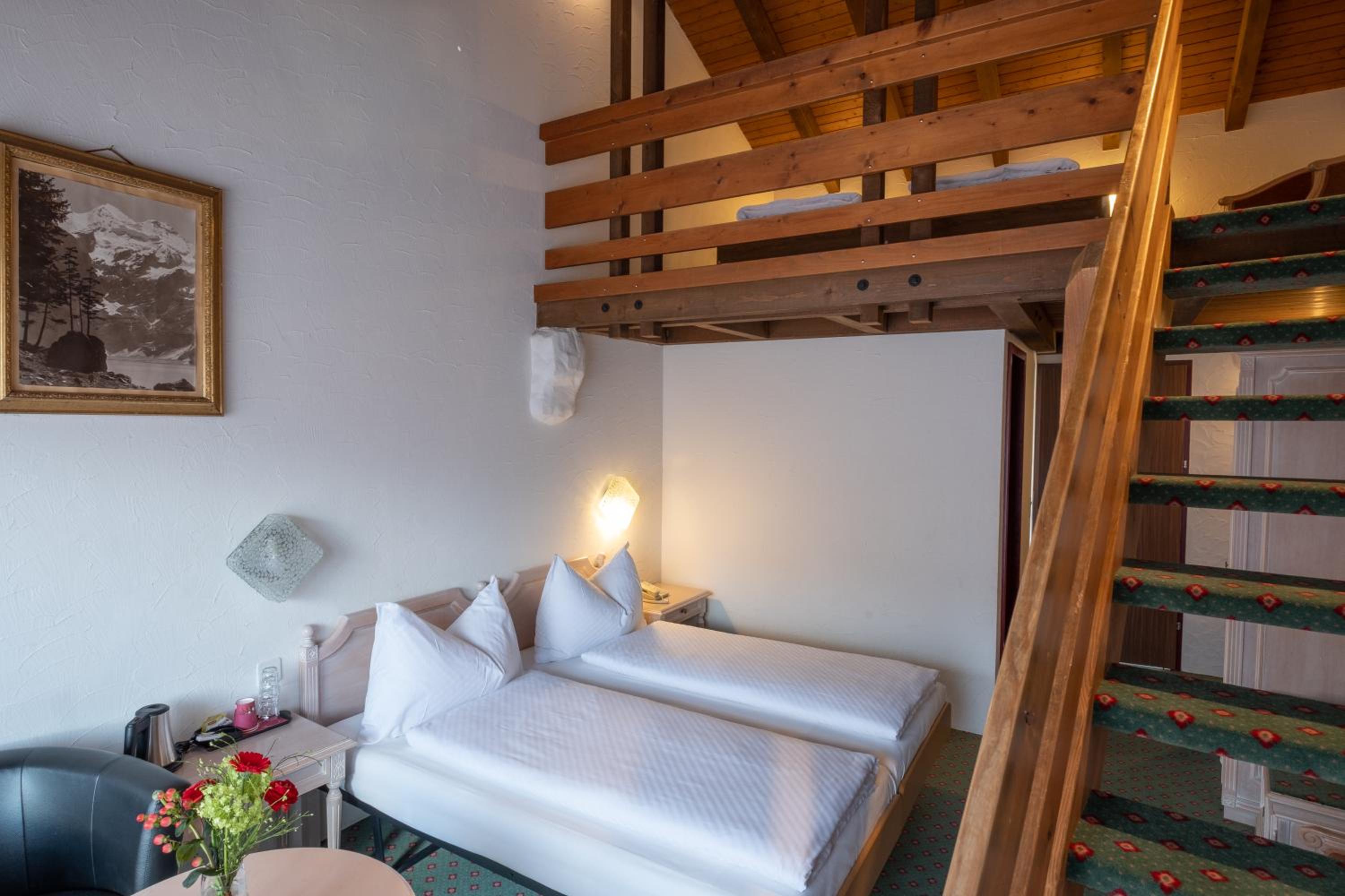 Family Quad Room with Balcony - Photo 1