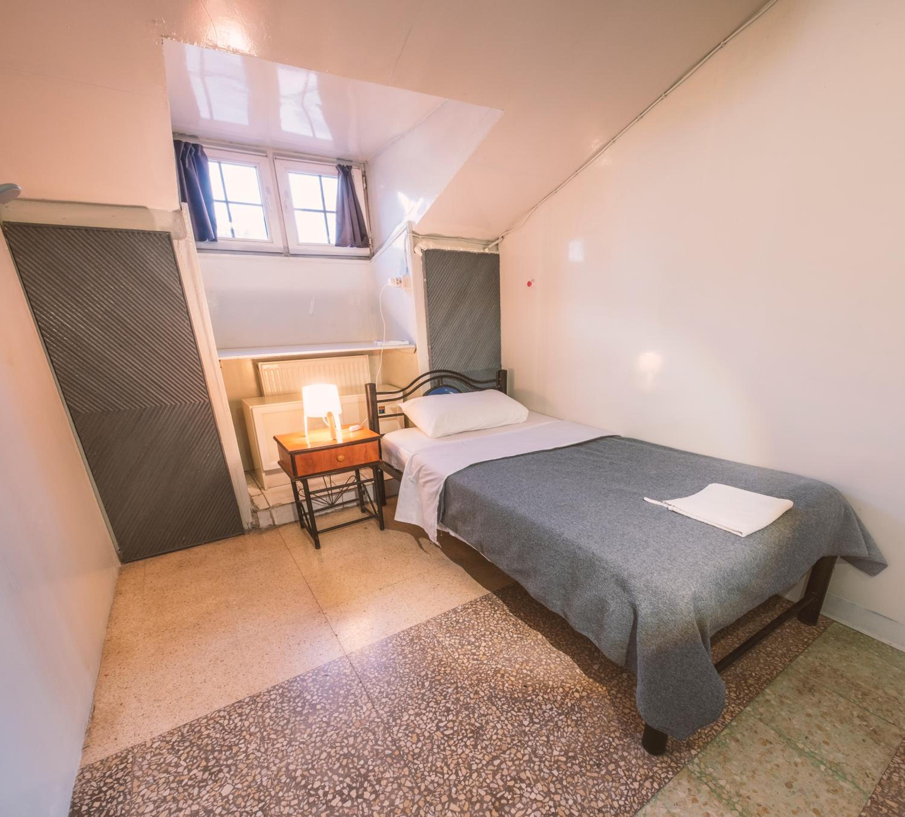 Single Room with Shared Shower and Toilet