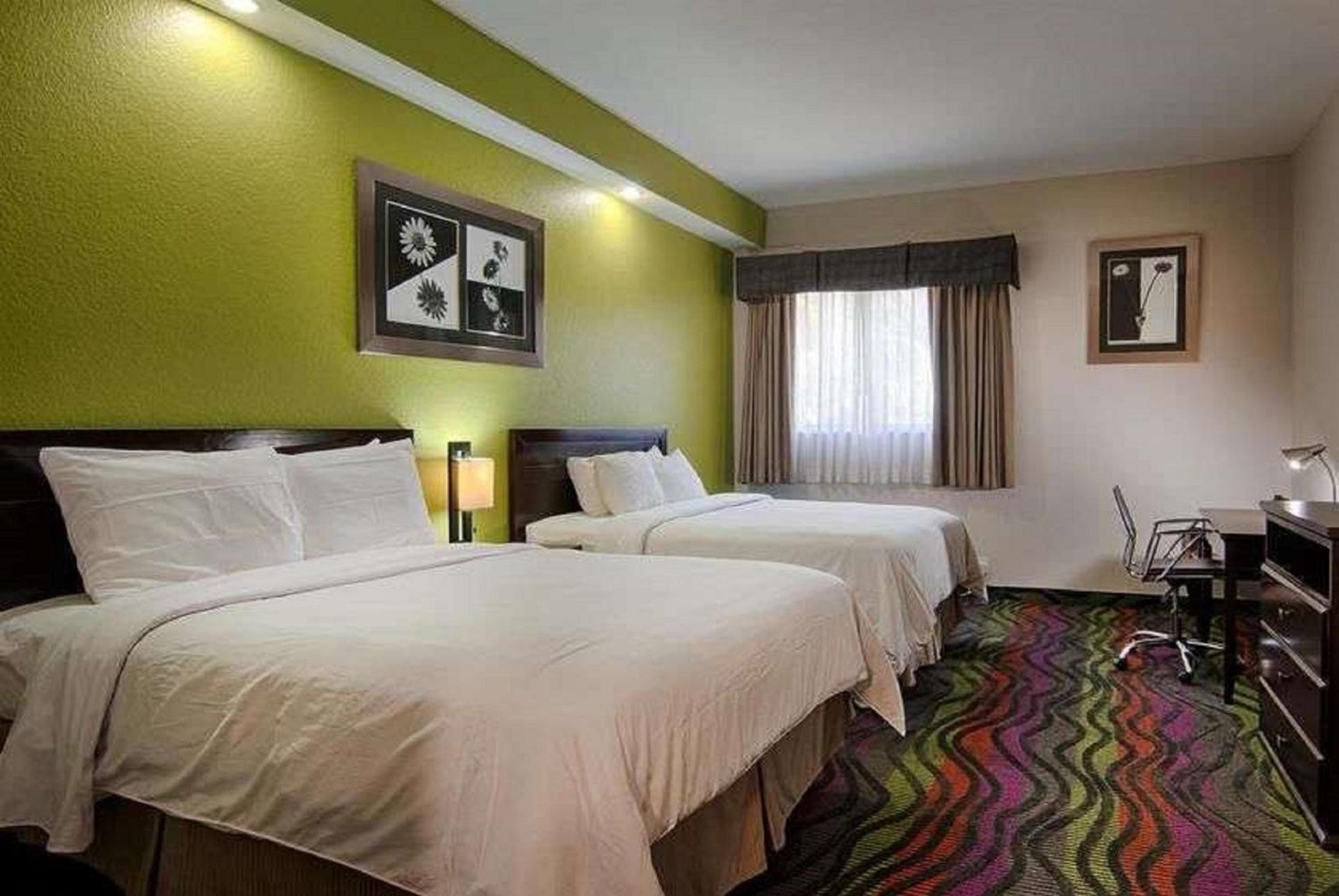 Queen Room with Two Queen Beds - Non-Smoking - Photo 1