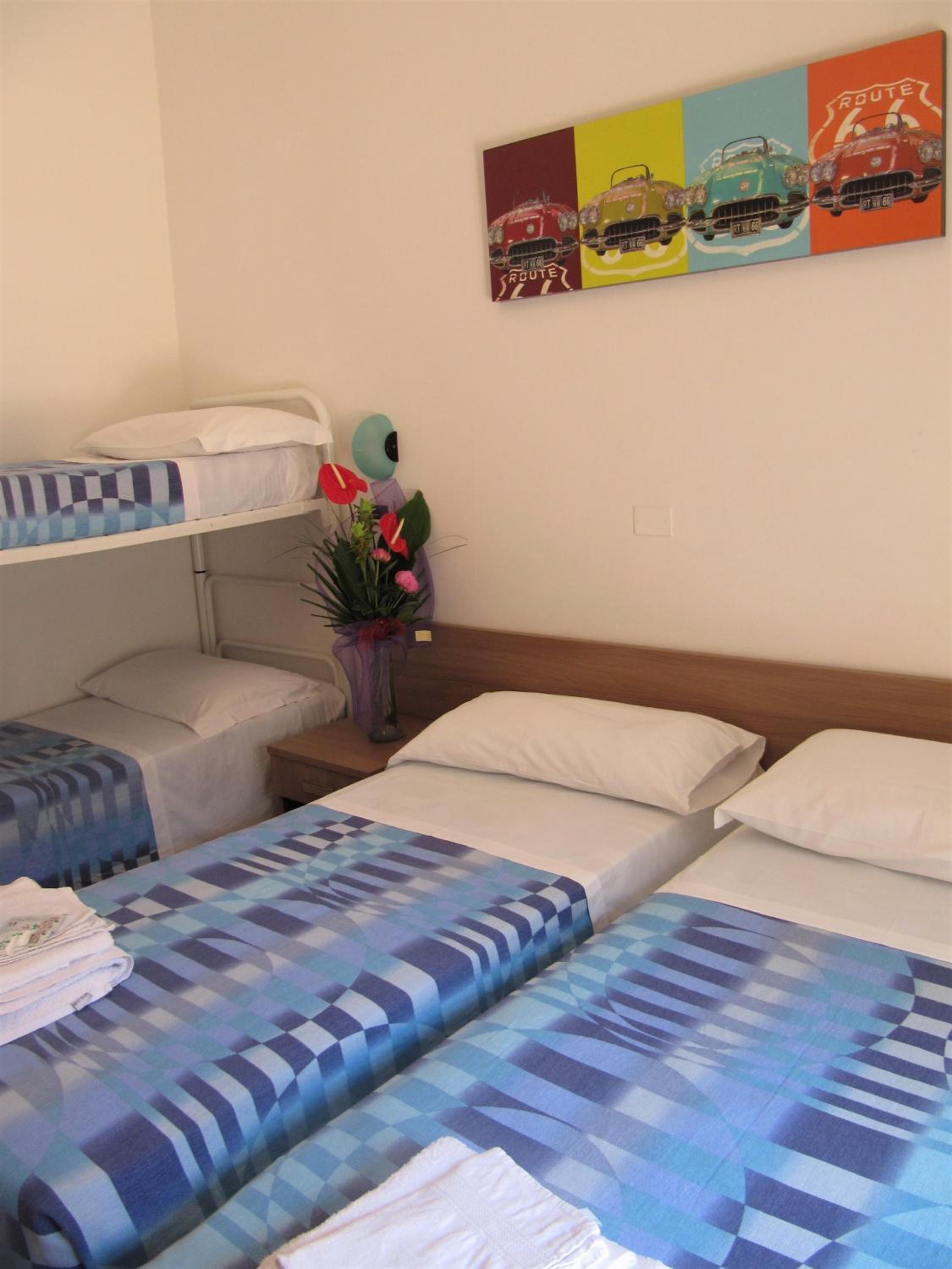 Quadruple Room with Balcony - Photo 1