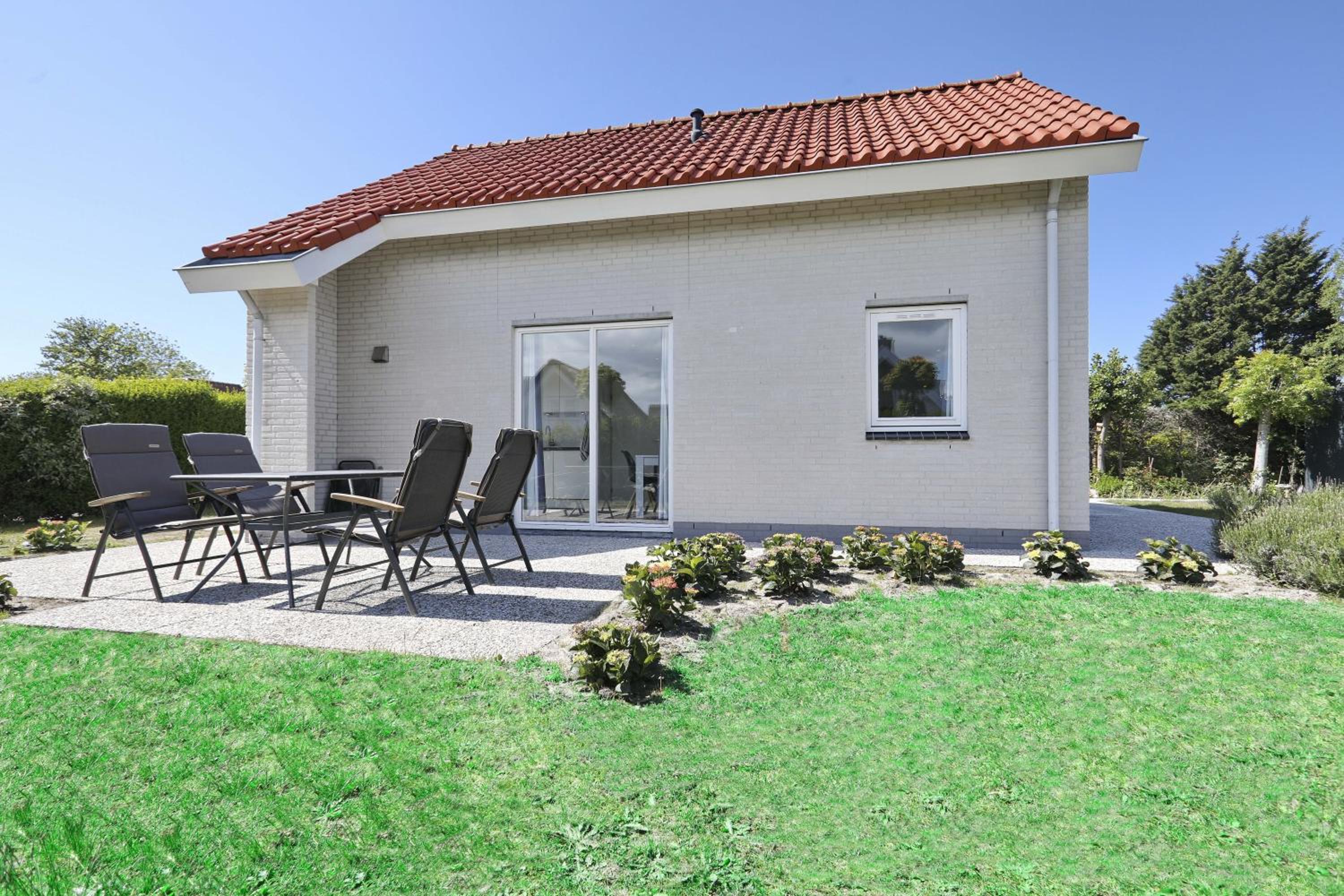 Three-Bedroom House - Photo 29