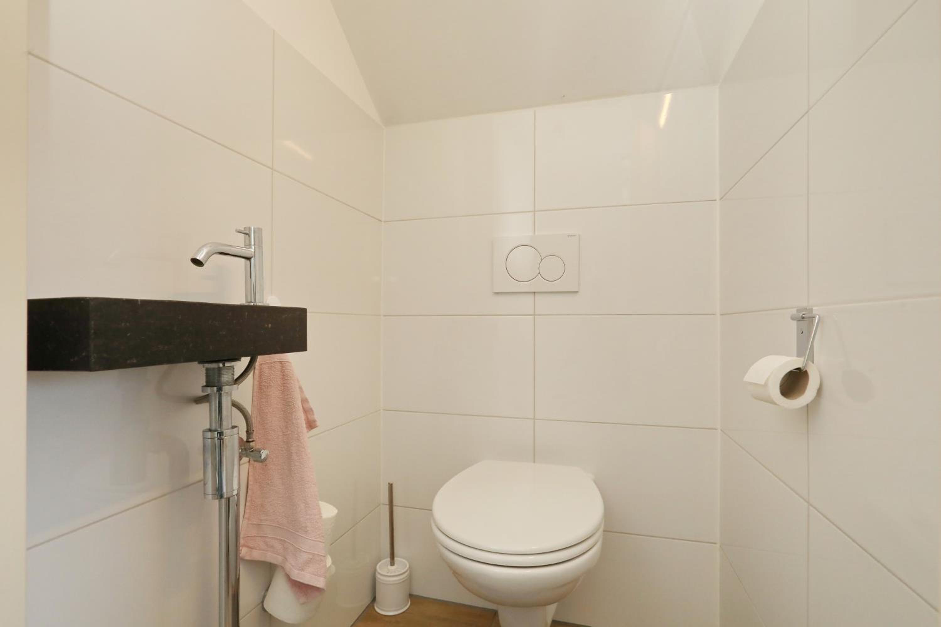 Three-Bedroom House - Photo 34