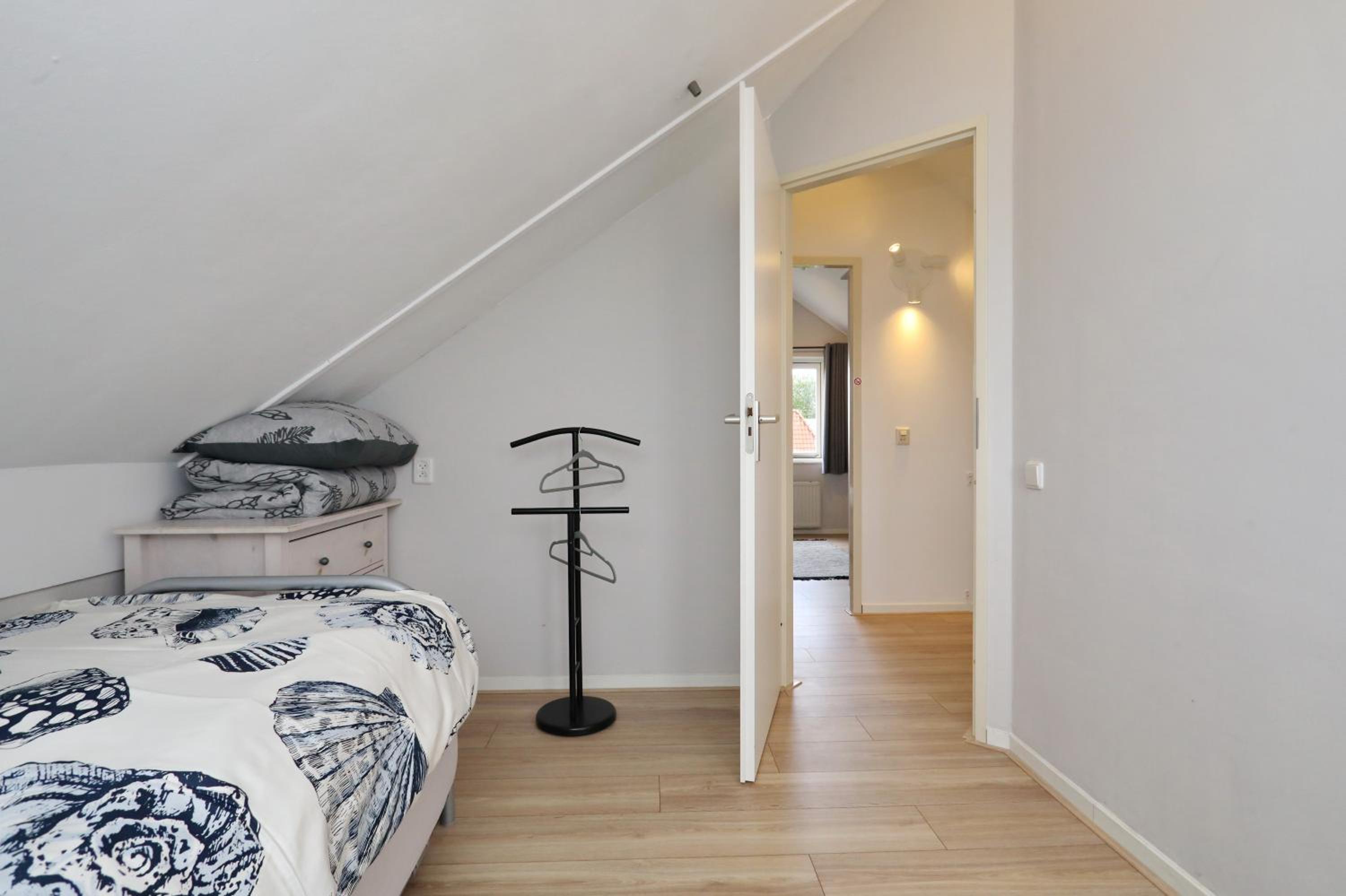 Three-Bedroom House - Photo 11