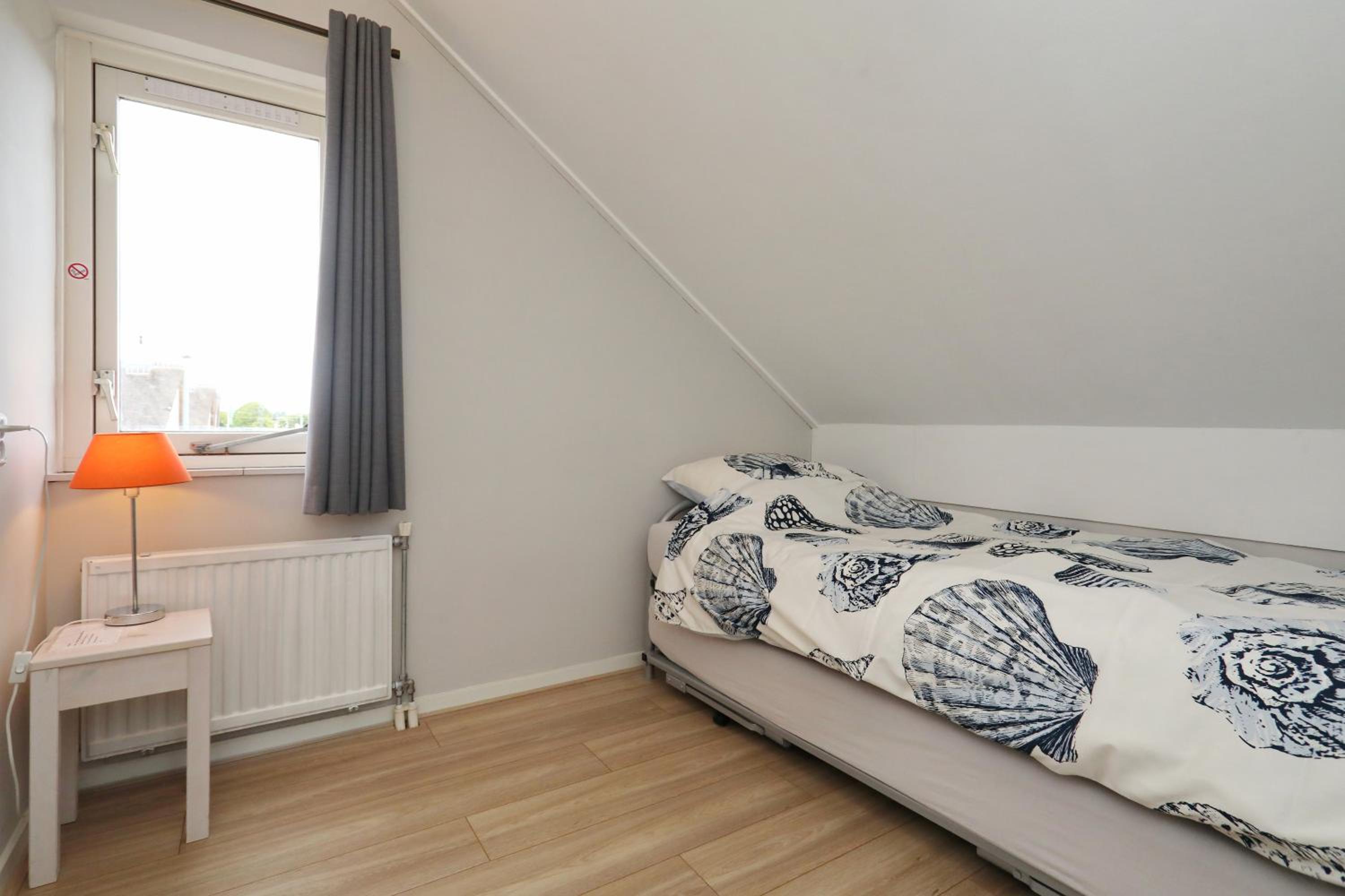 Three-Bedroom House - Photo 13