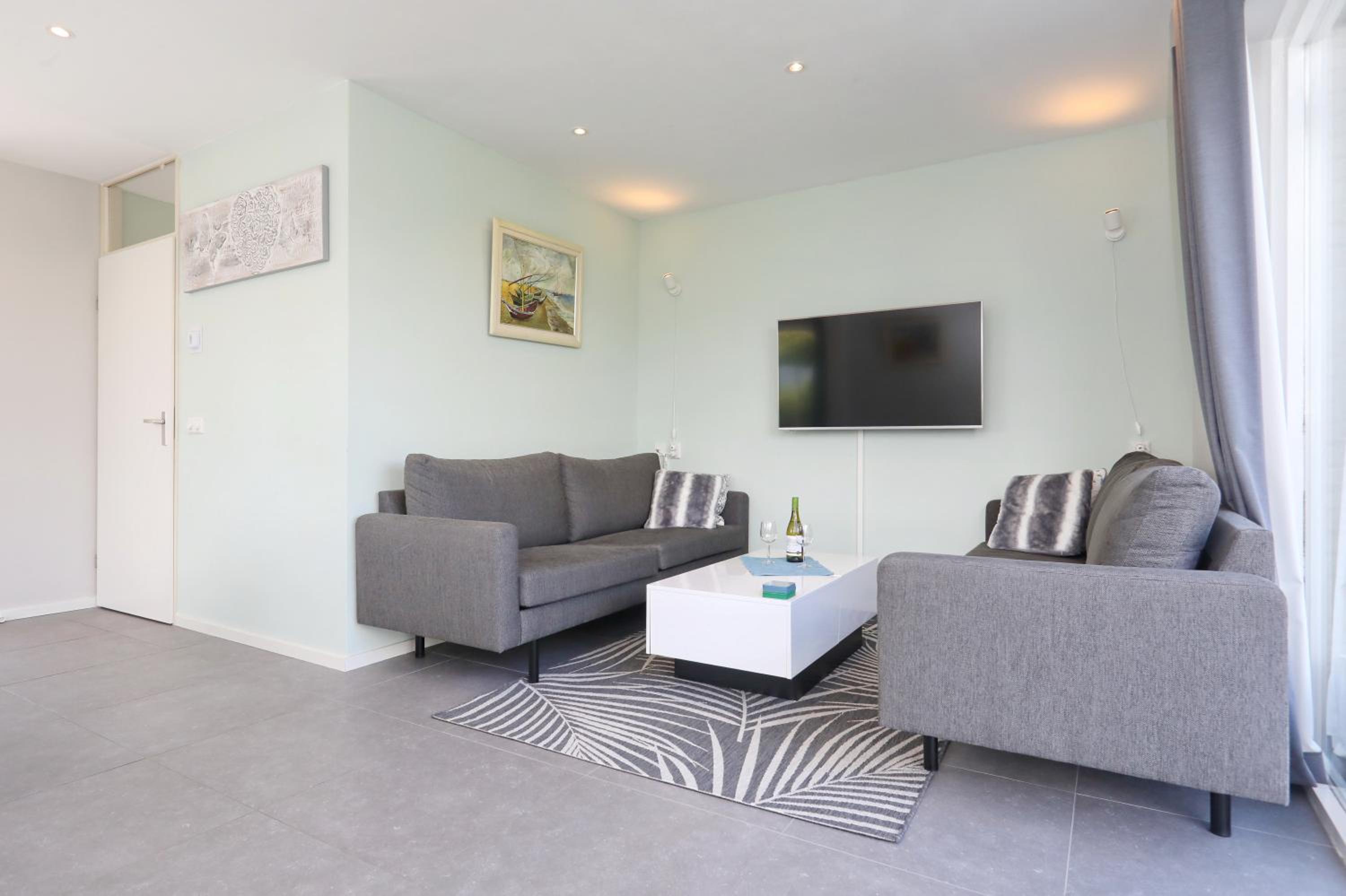 Three-Bedroom House - Photo 22
