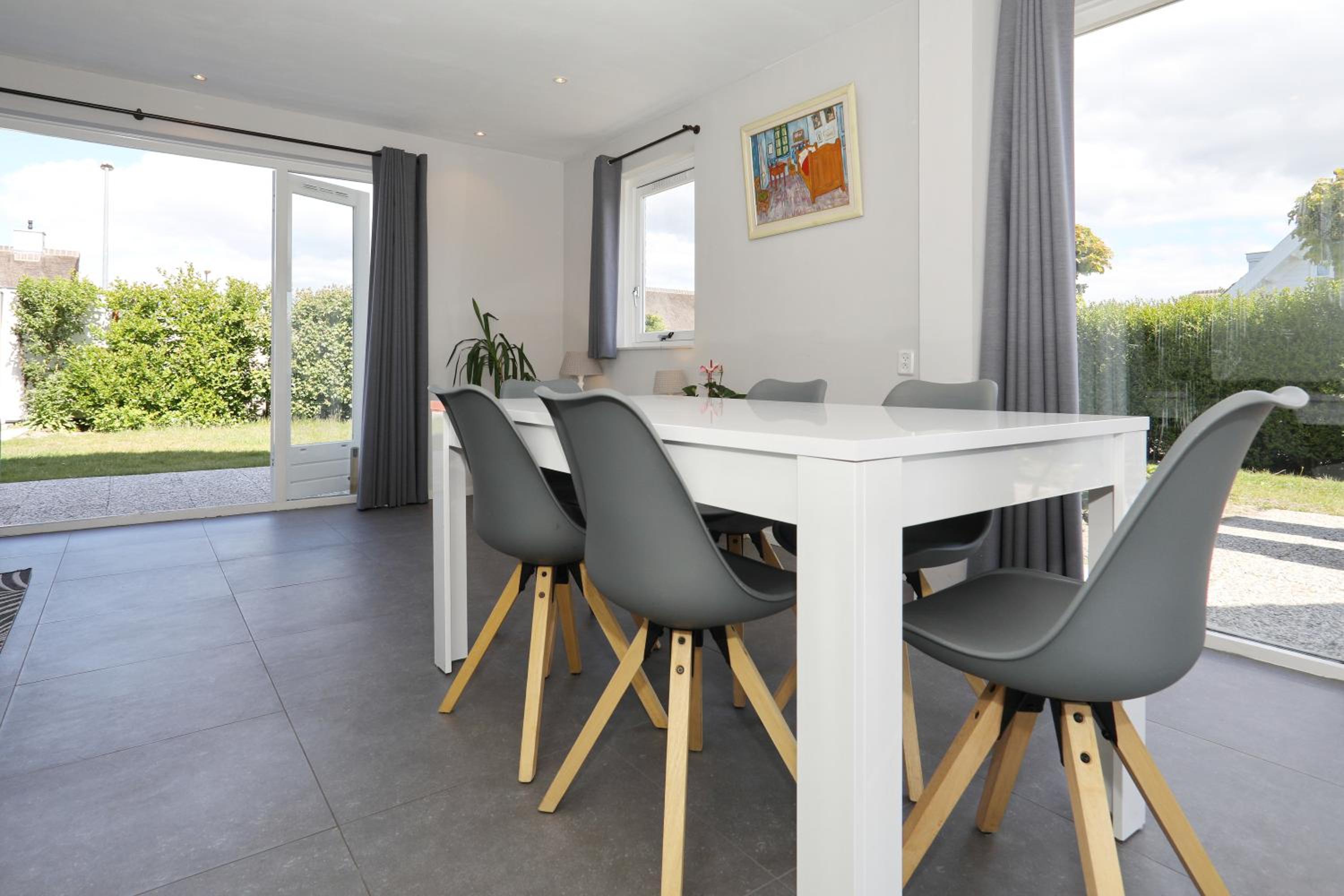 Three-Bedroom House - Photo 26