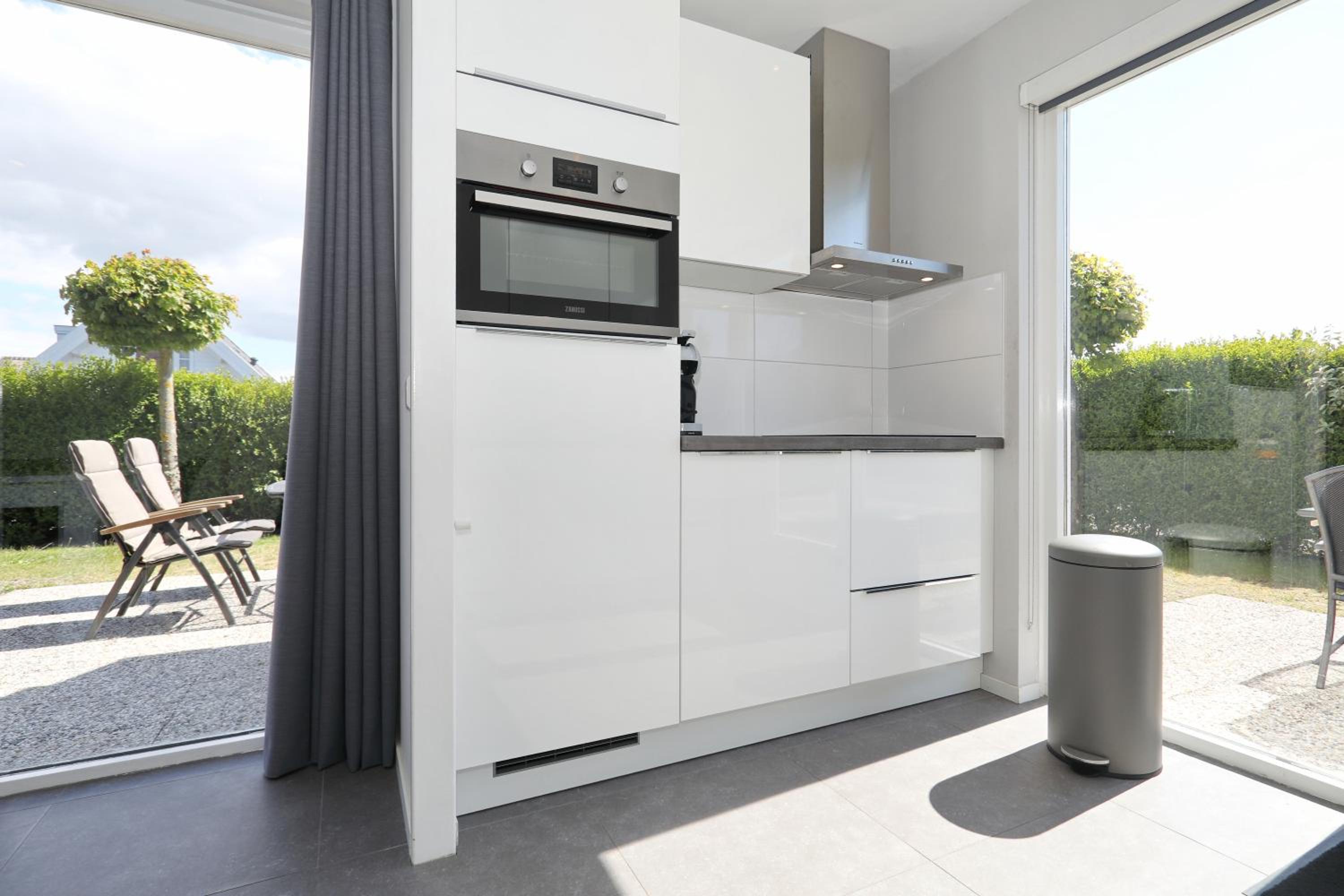 Three-Bedroom House - Photo 27