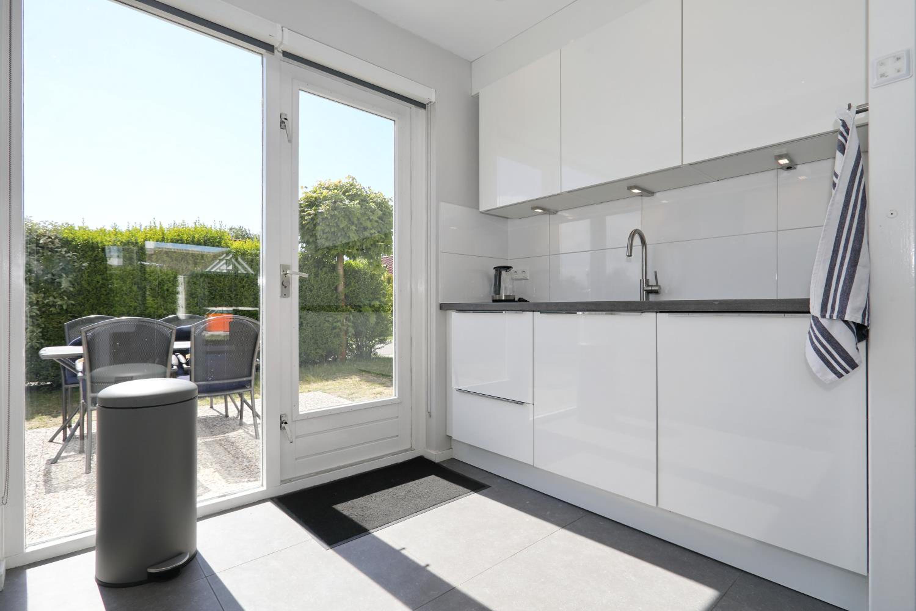 Three-Bedroom House - Photo 28