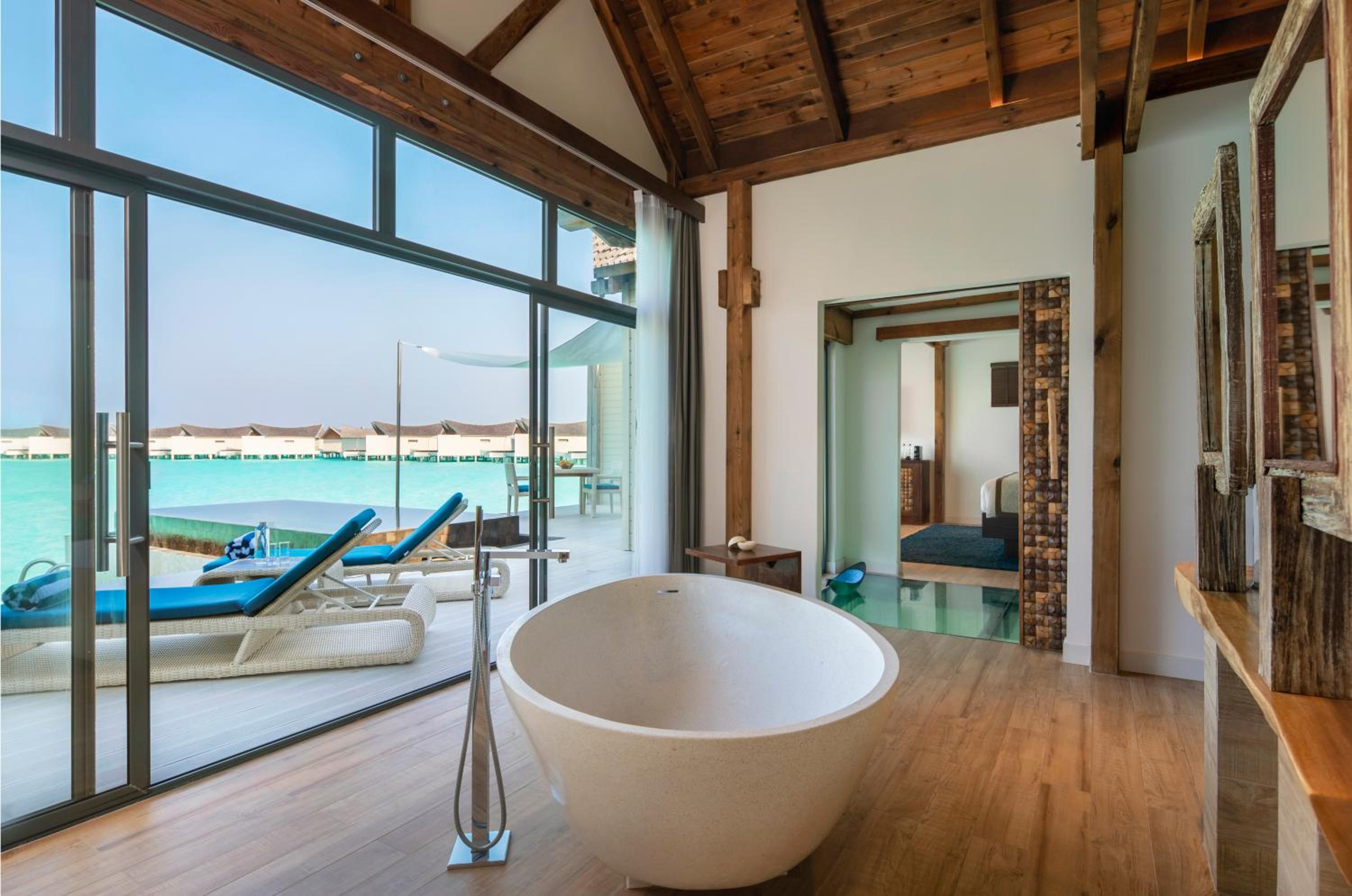 Overwater Pool Villa Lagoon, see-through floor, infinity pool, daily free flow chocolate hour, free snorkeling gear & non-motorized water sports photo 2
