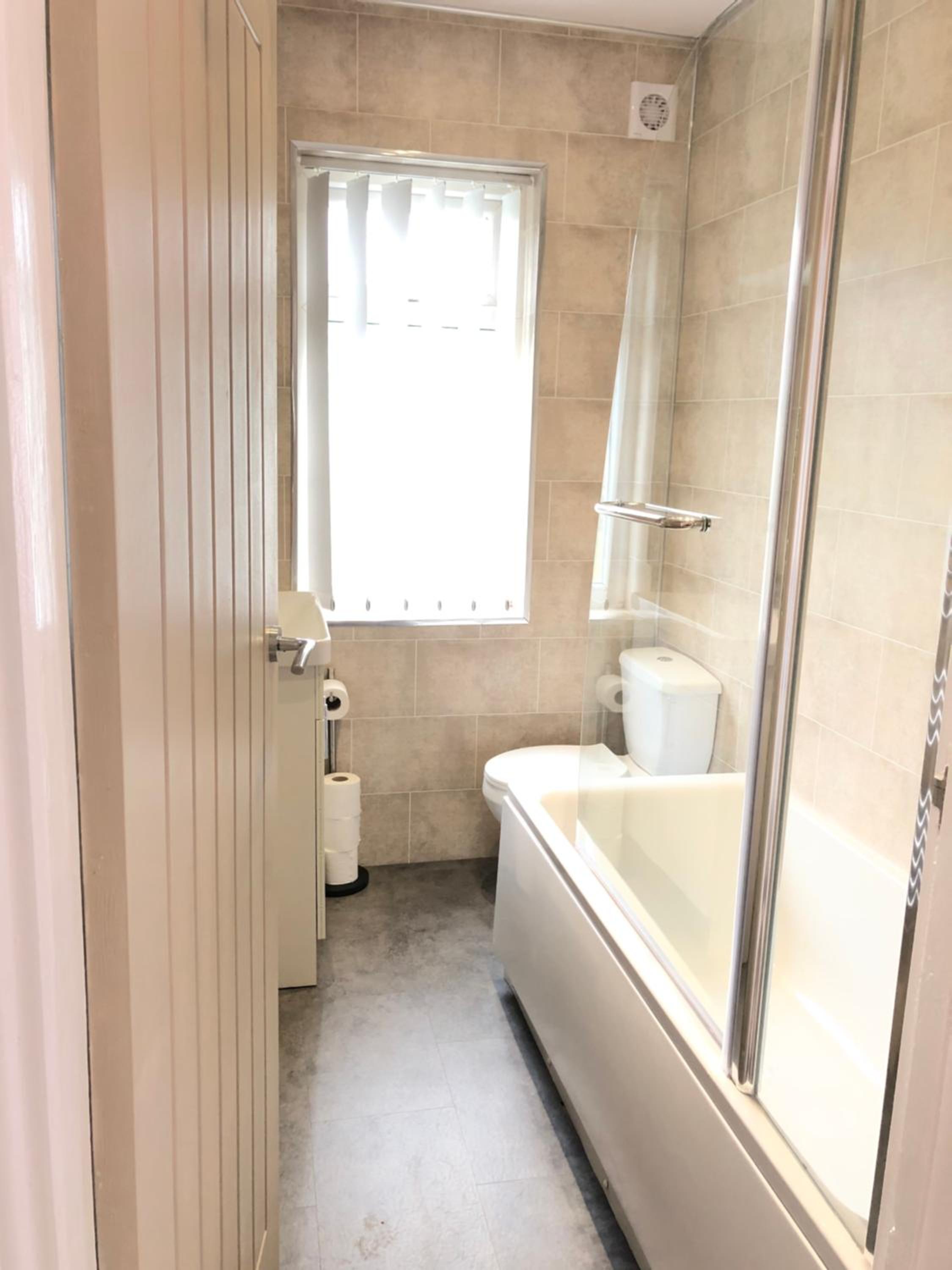 Three-Bedroom House - Photo 12