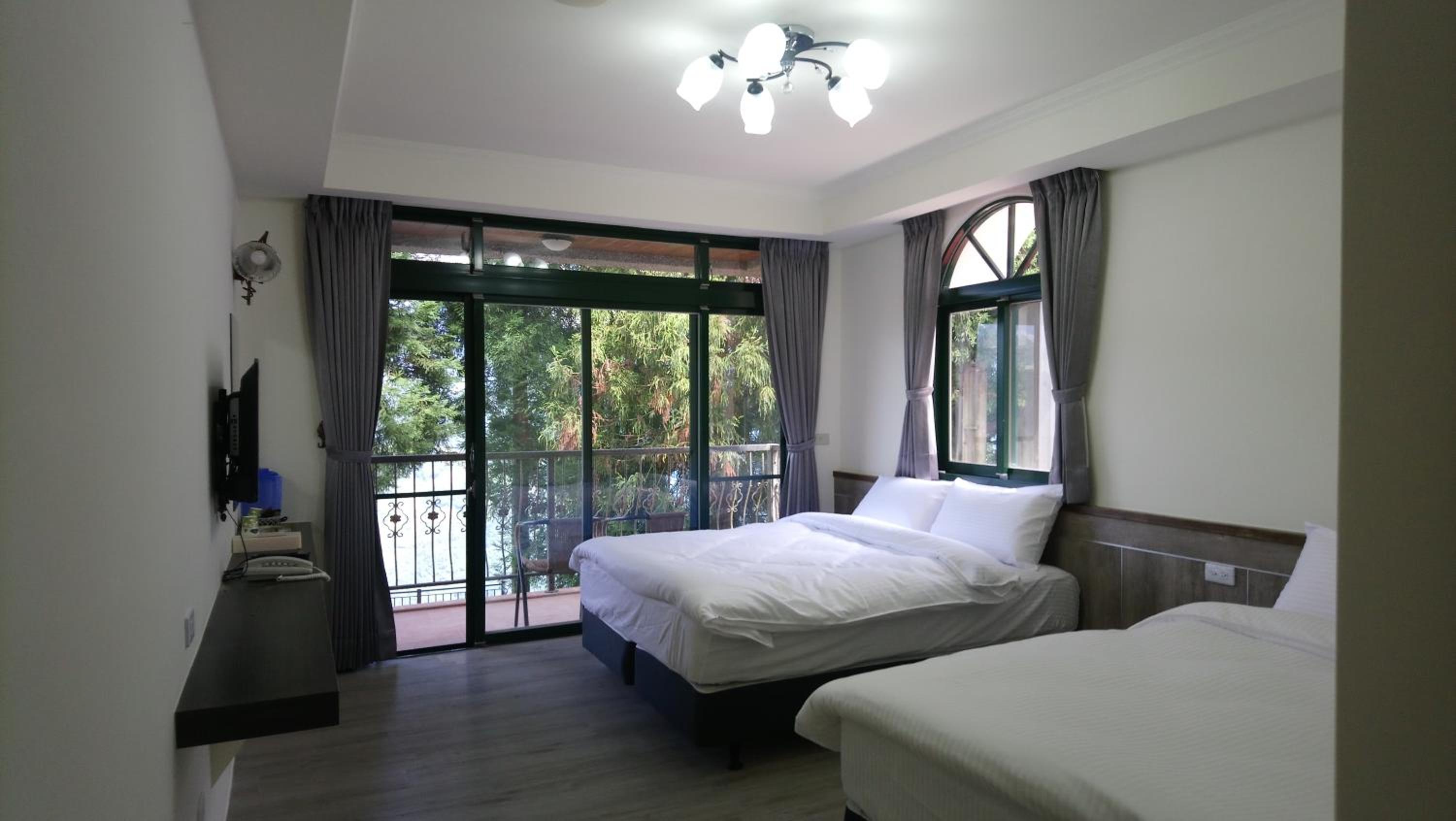 Quadruple Room with Balcony photo 2