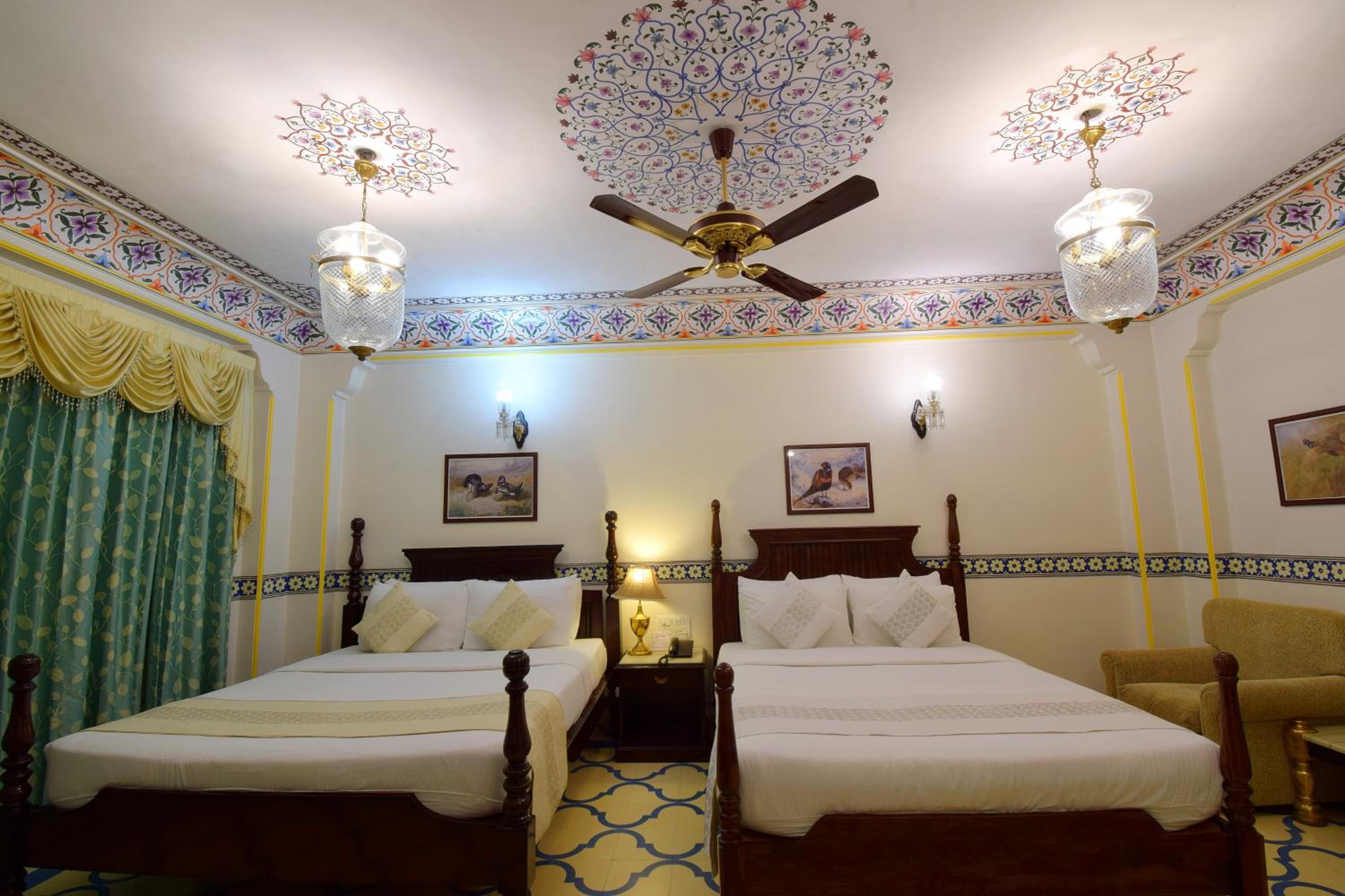 Royal Deluxe Double Room with Car and Chauffeur, Free pickup on arrival from train or bus station, daily Rajasthani dance & music show from 7–9 PM, swimming pool, and a dedicated travel desk to assist with local sightseeing tours and activities - Photo 16
