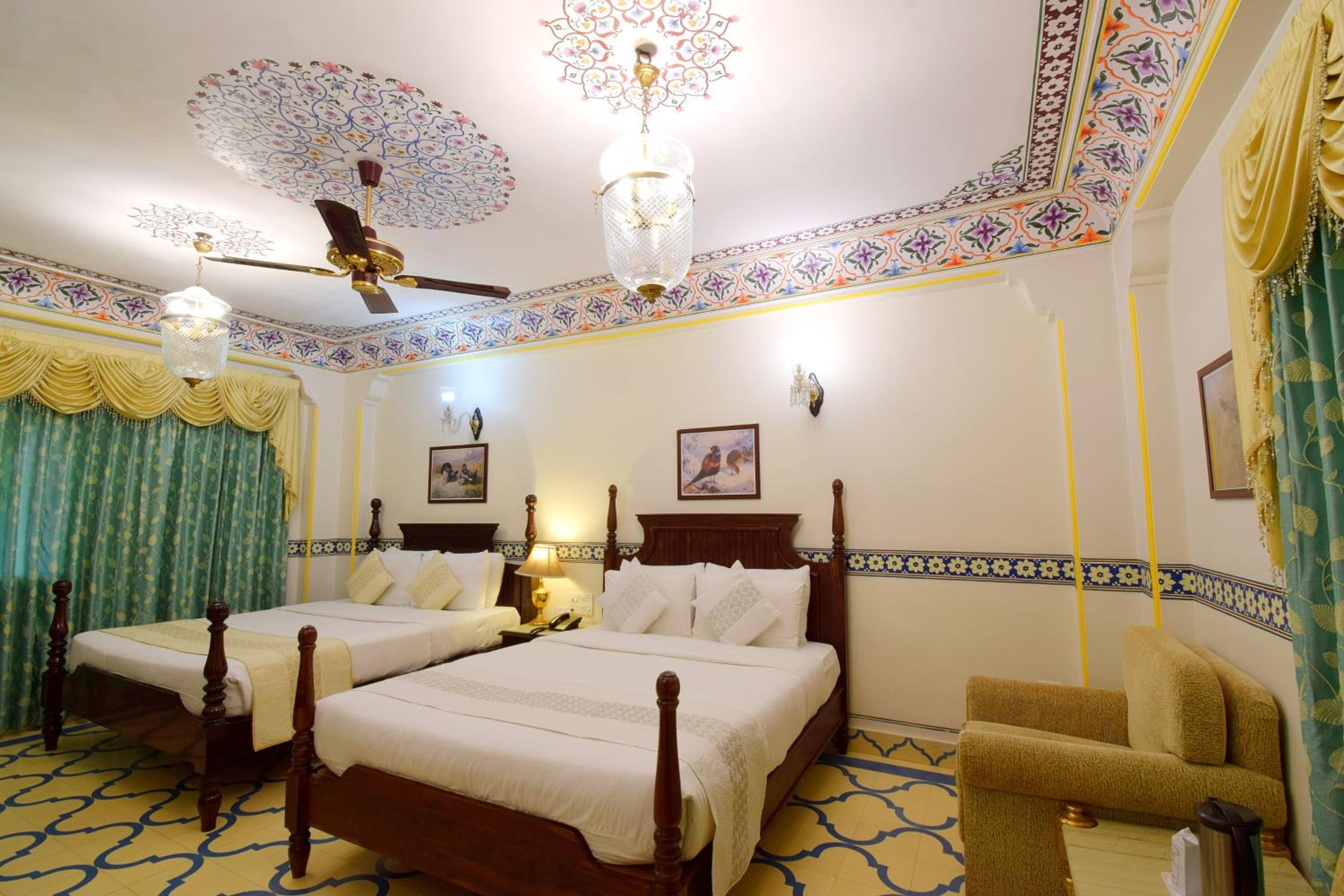Royal Deluxe Double Room with Car and Chauffeur, Free pickup on arrival from train or bus station, daily Rajasthani dance & music show from 7–9 PM, swimming pool, and a dedicated travel desk to assist with local sightseeing tours and activities - Photo 17
