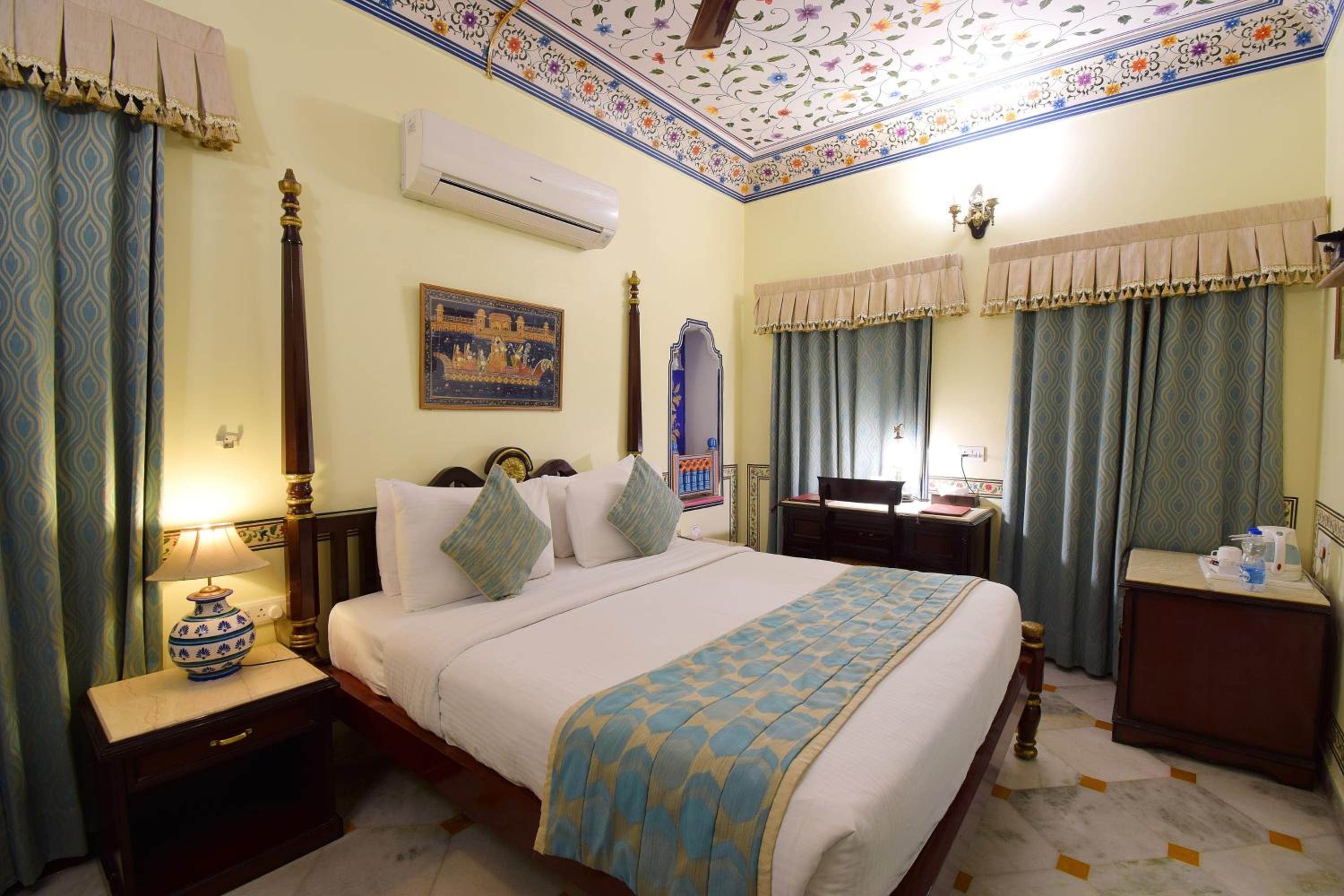 Royal Deluxe Double Room with Car and Chauffeur, Free pickup on arrival from train or bus station, daily Rajasthani dance & music show from 7–9 PM, swimming pool, and a dedicated travel desk to assist with local sightseeing tours and activities - Photo 5