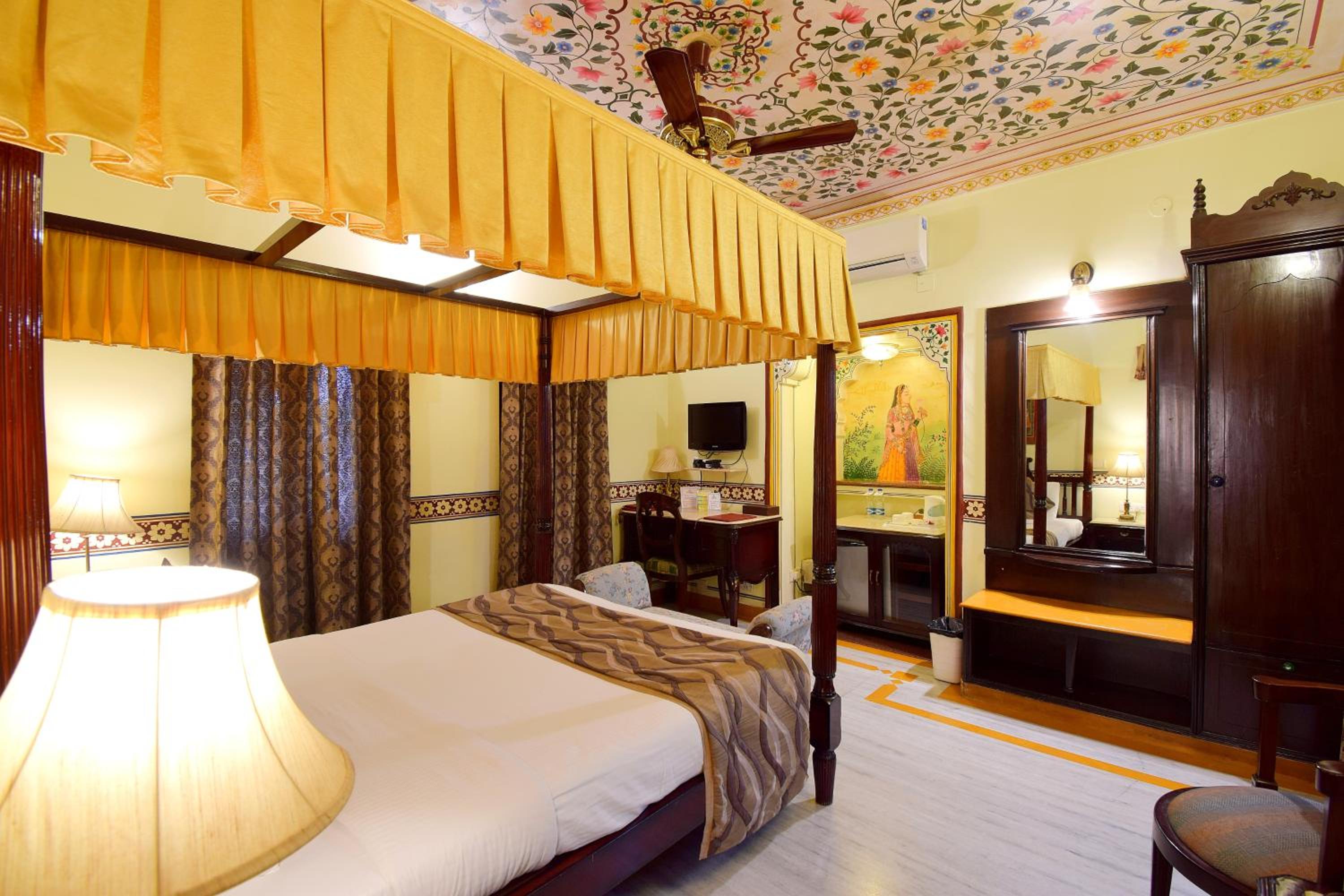 Royal Deluxe Double Room with Car and Chauffeur, Free pickup on arrival from train or bus station, daily Rajasthani dance & music show from 7–9 PM, swimming pool, and a dedicated travel desk to assist with local sightseeing tours and activities - Photo 6