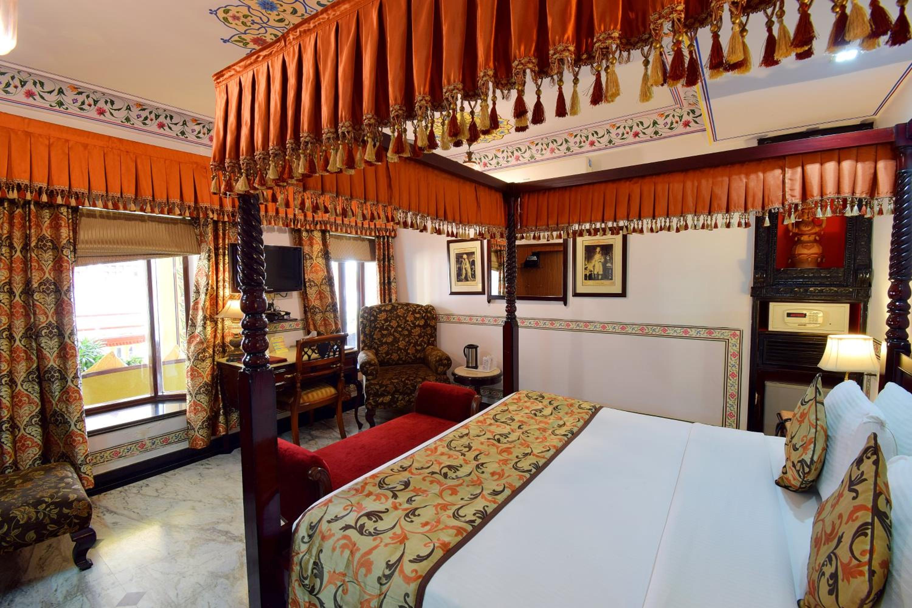 Royal Deluxe Double Room with Car and Chauffeur, Free pickup on arrival from train or bus station, daily Rajasthani dance & music show from 7–9 PM, swimming pool, and a dedicated travel desk to assist with local sightseeing tours and activities - Photo 7