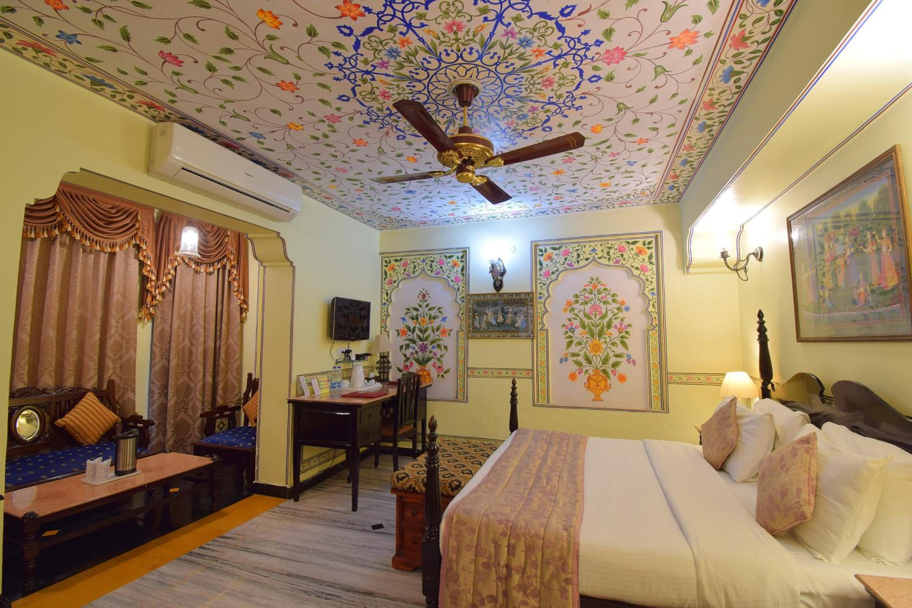 Royal Deluxe Double Room with Car and Chauffeur, Free pickup on arrival from train or bus station, daily Rajasthani dance & music show from 7–9 PM, swimming pool, and a dedicated travel desk to assist with local sightseeing tours and activities - Photo 8