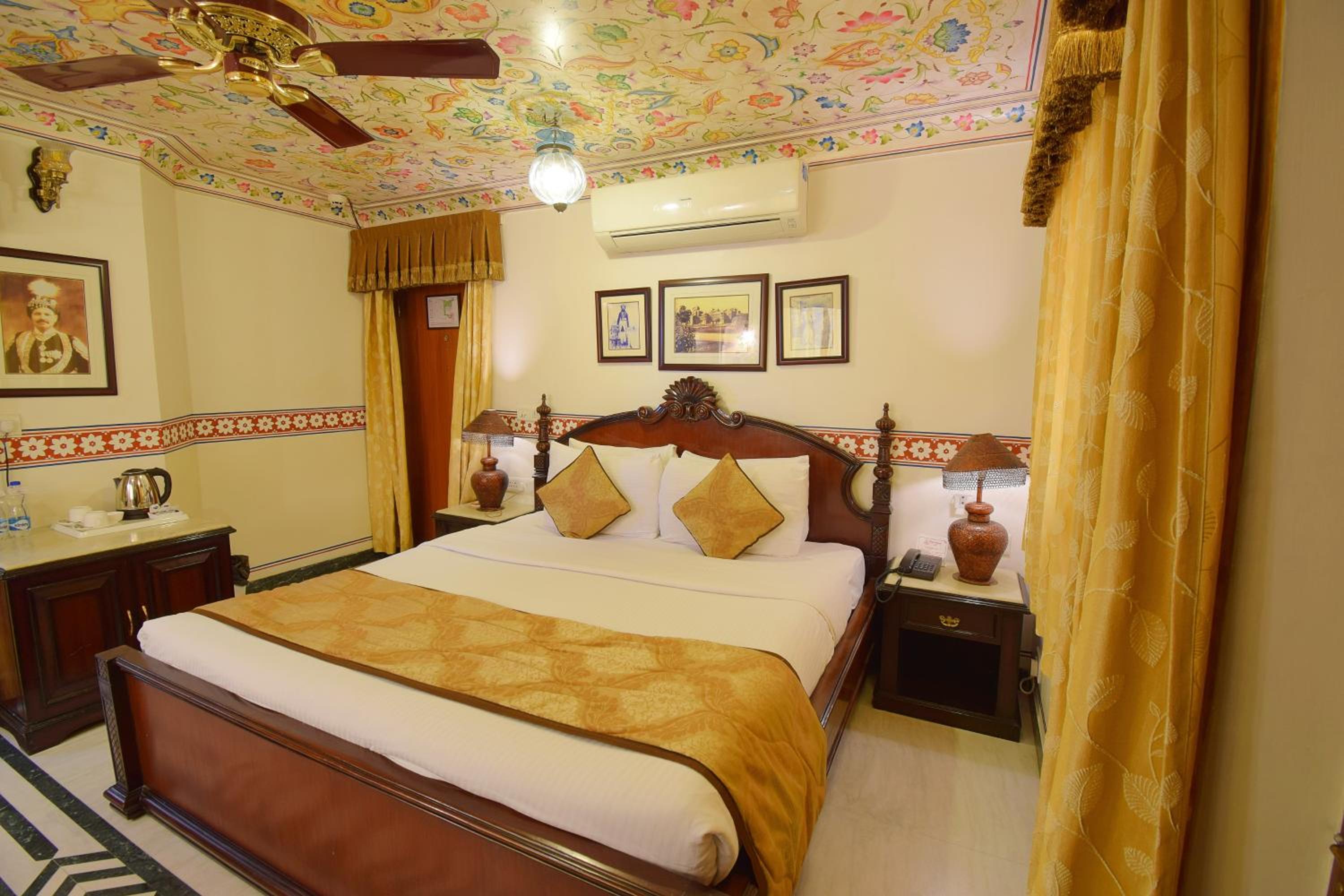 Royal Deluxe Double Room with Car and Chauffeur, Free pickup on arrival from train or bus station, daily Rajasthani dance & music show from 7–9 PM, swimming pool, and a dedicated travel desk to assist with local sightseeing tours and activities - Photo 9